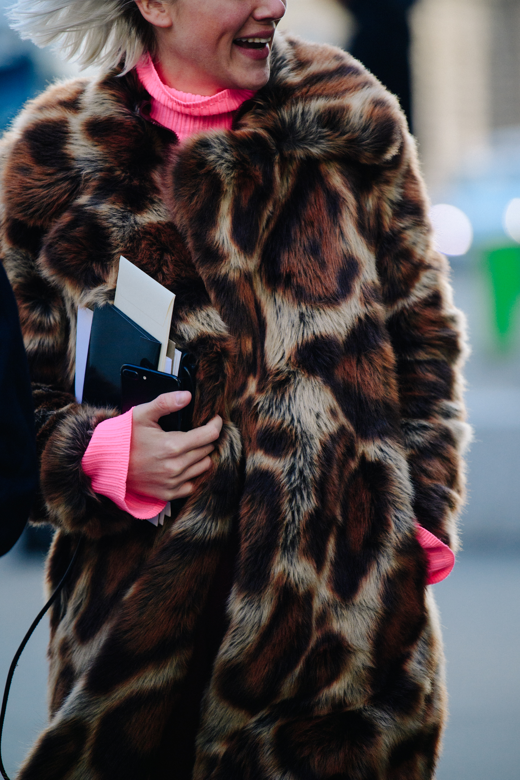 Woman wearing animal print coat