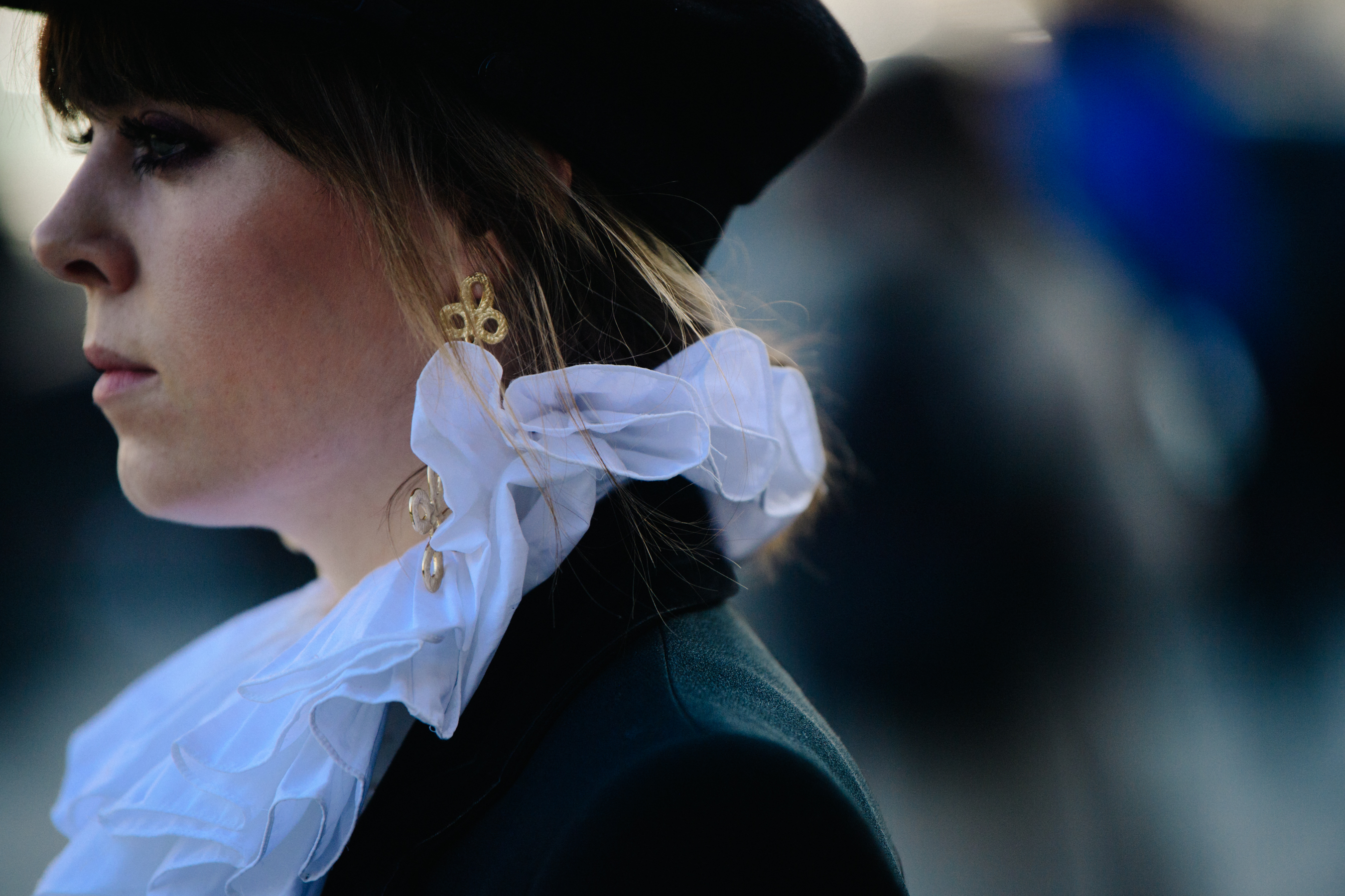 Woman wearing golden earrings