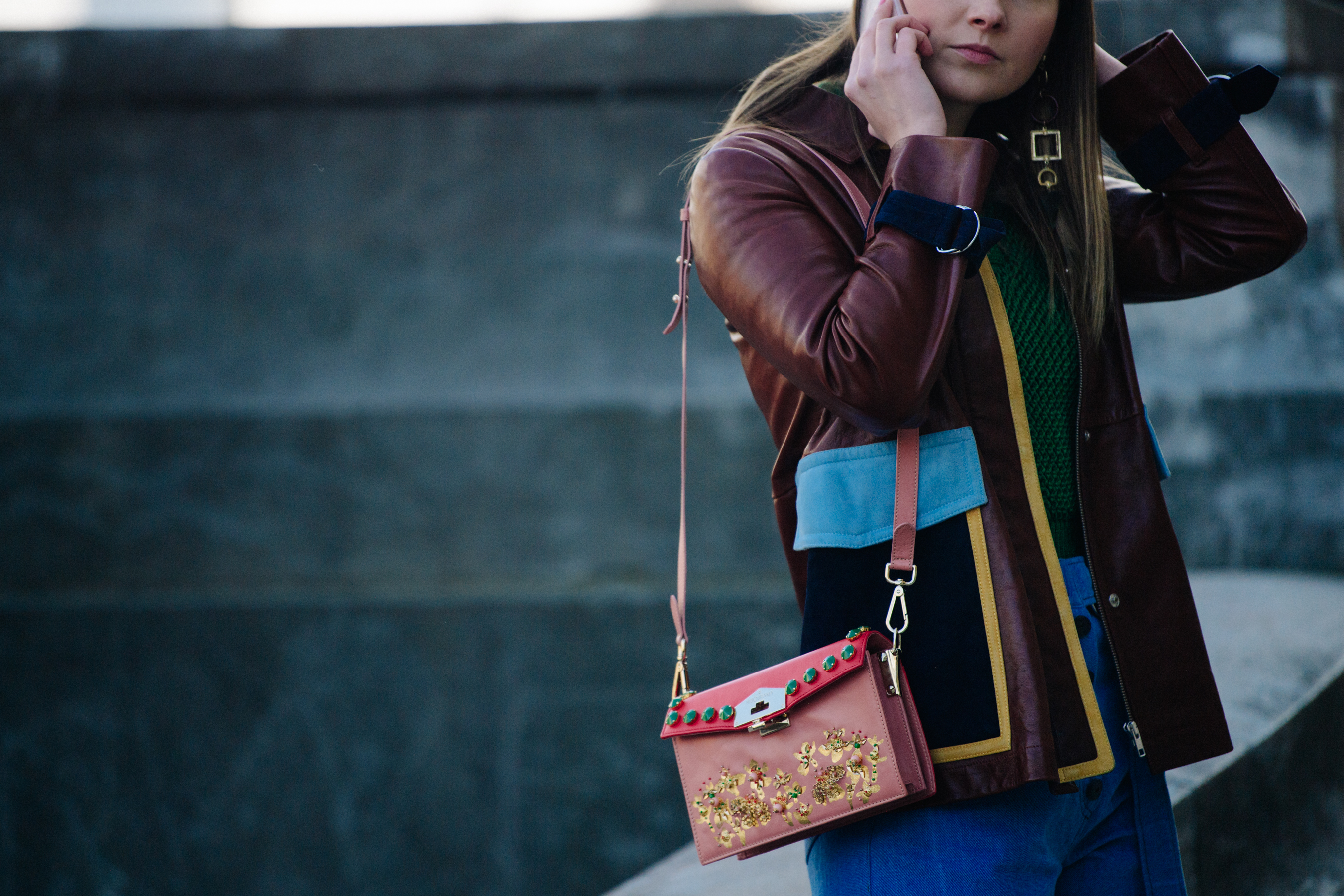 Woman wearing brown leather jacket