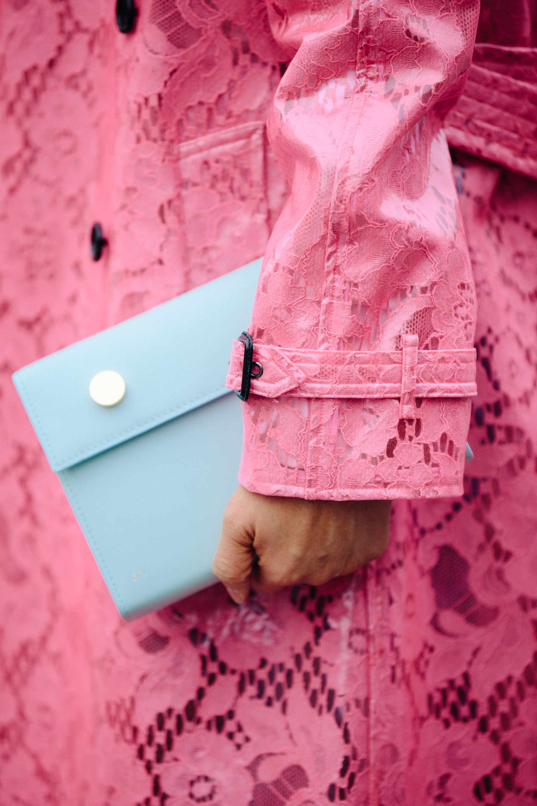 Woman wearing pink lace coat