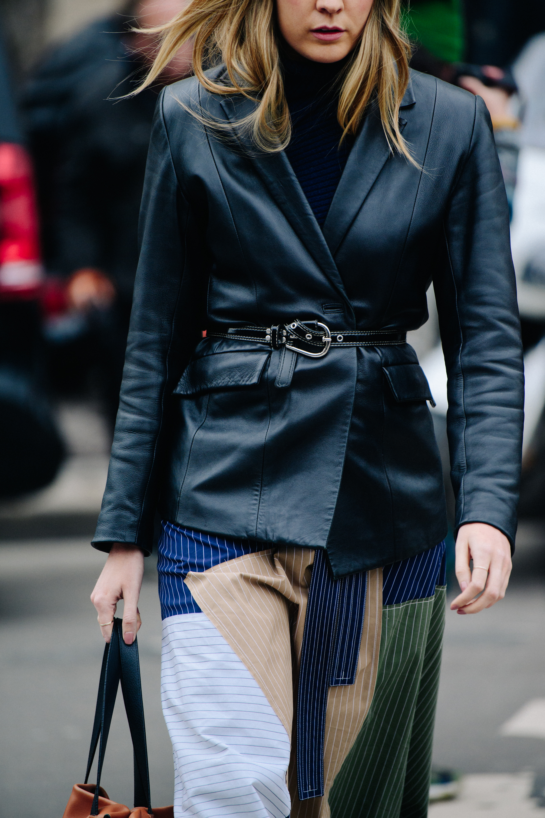 Woman wearing black leather jacket