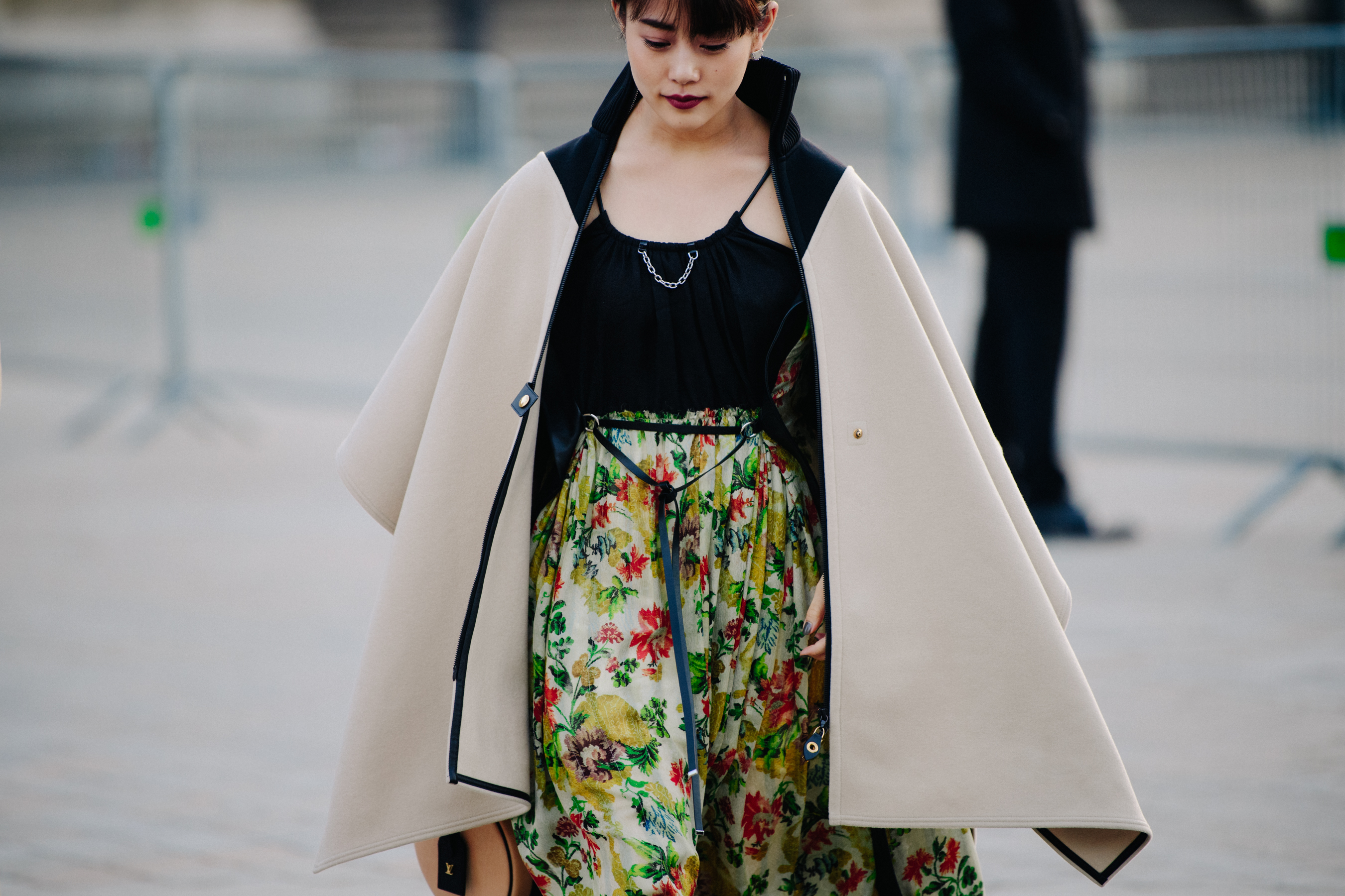 Asian woman wearing floral skirt