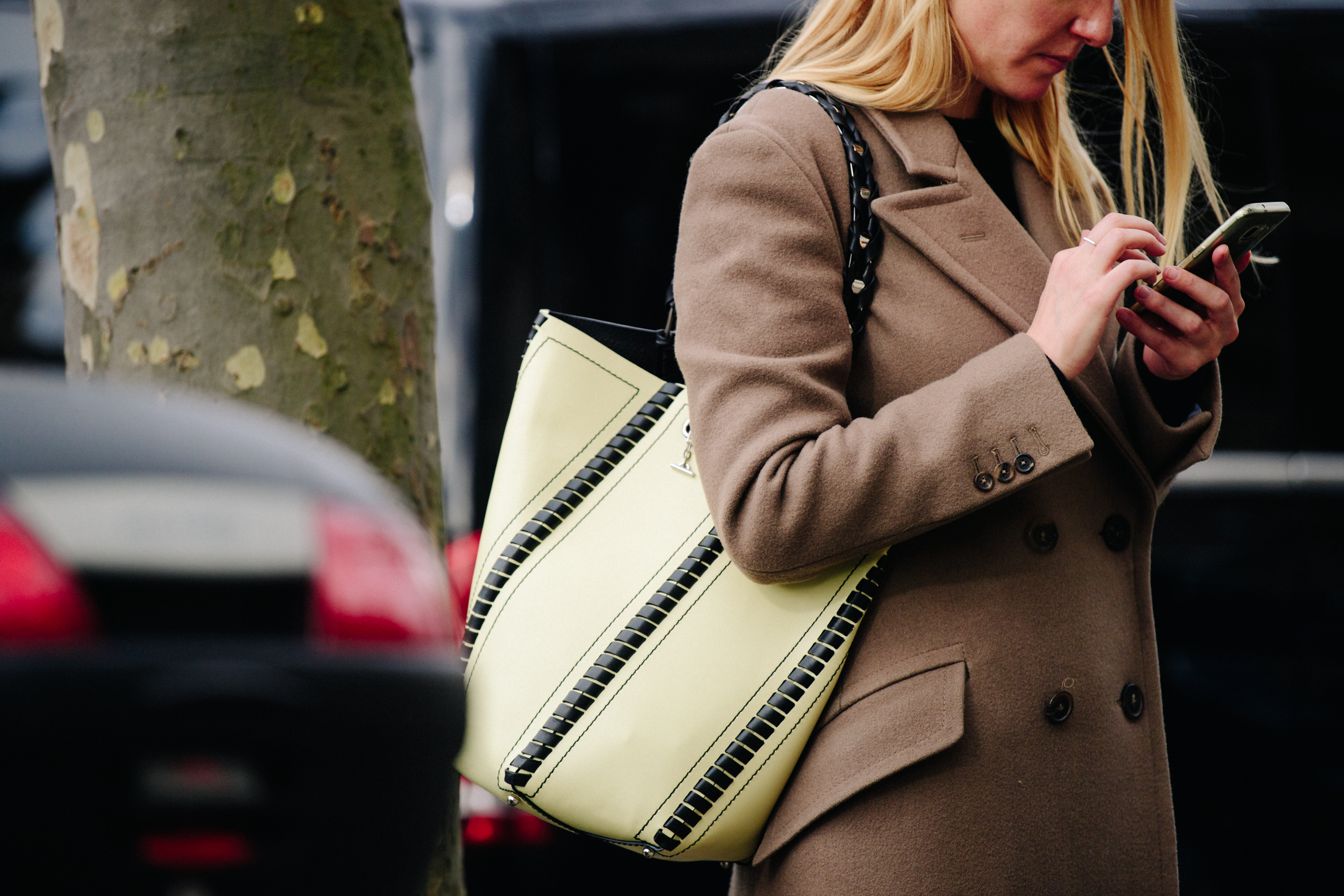 Woman wearing brown wool coat