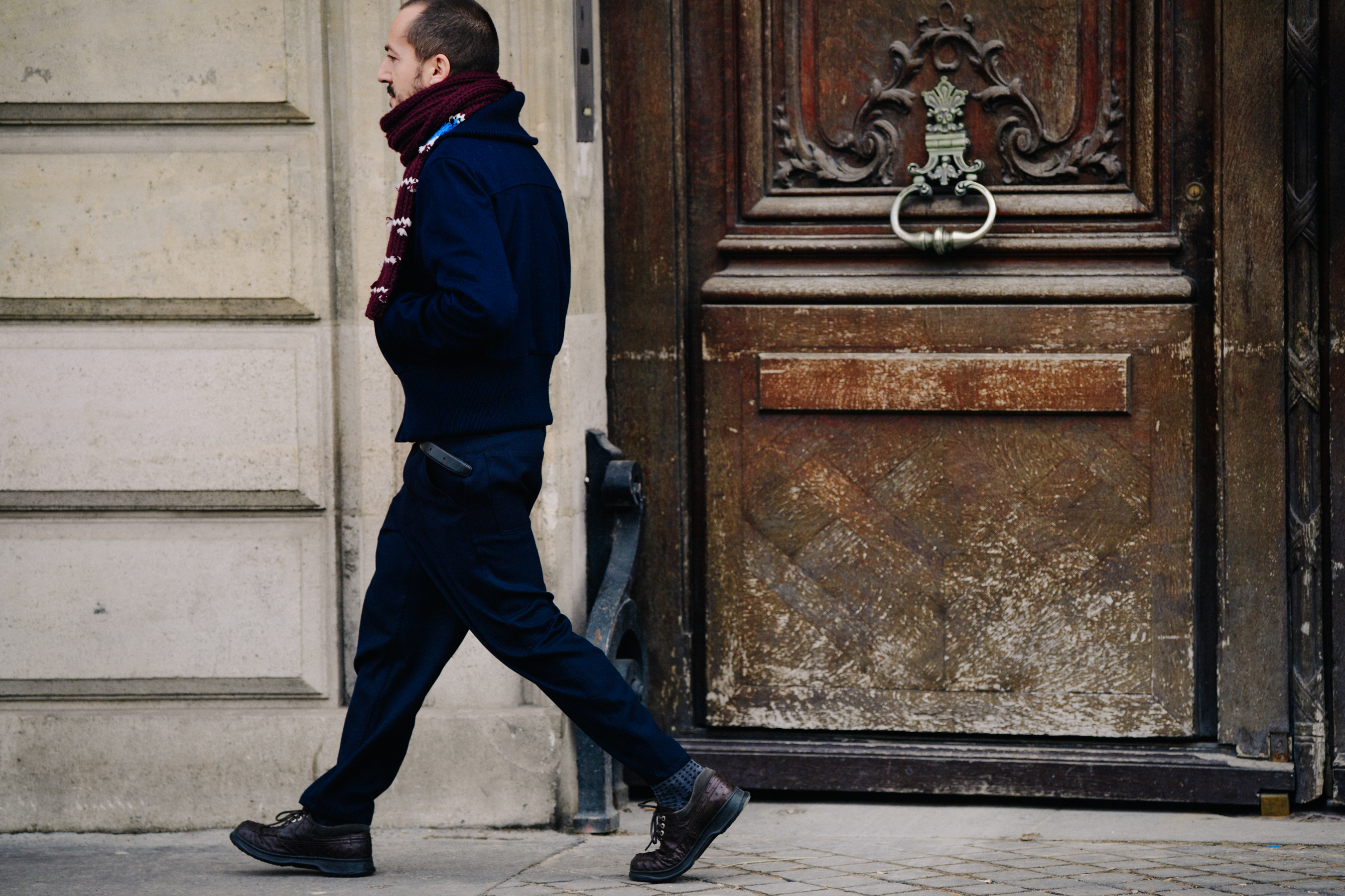 Man wearing blue outfit