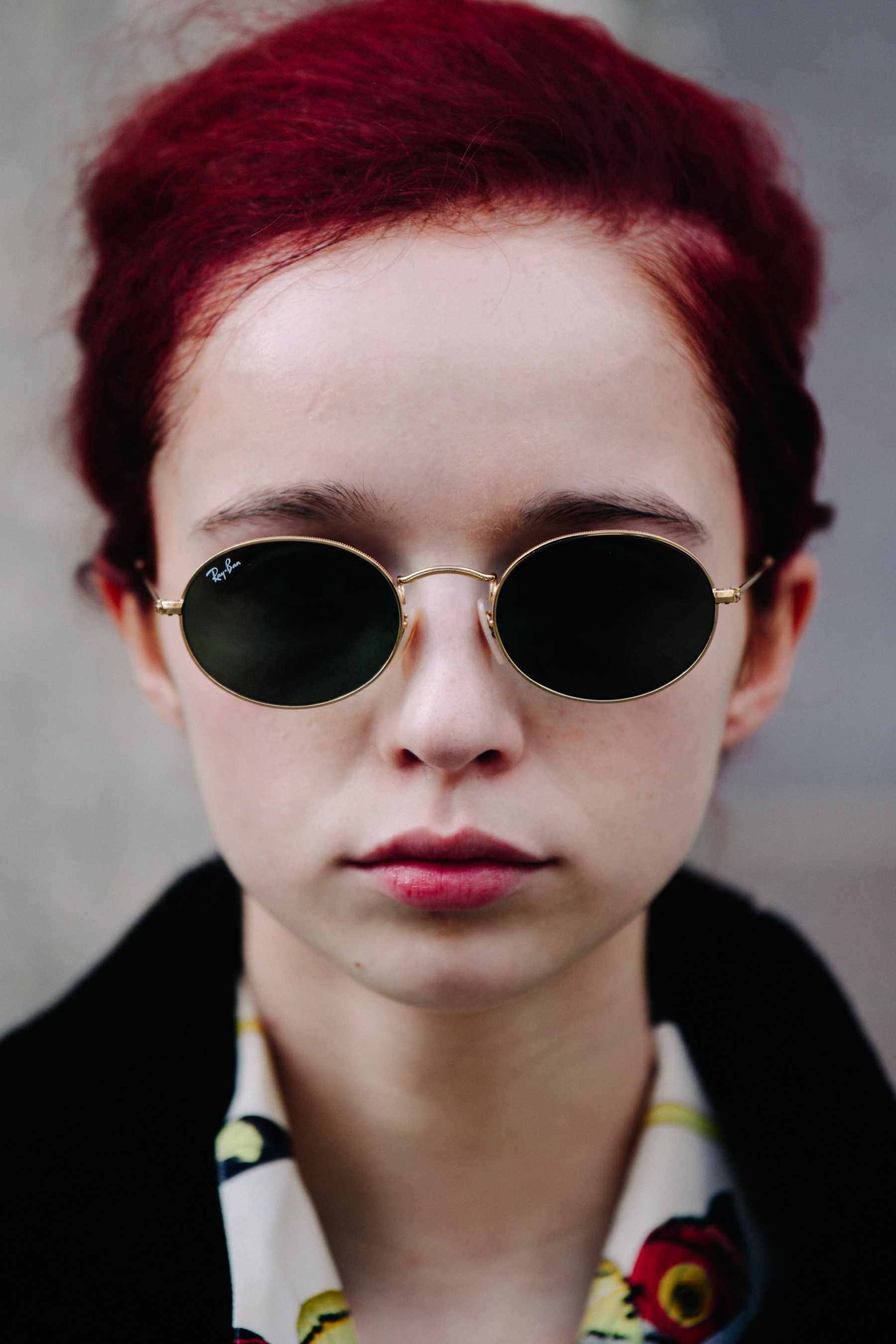 Portrait of model with short red hair