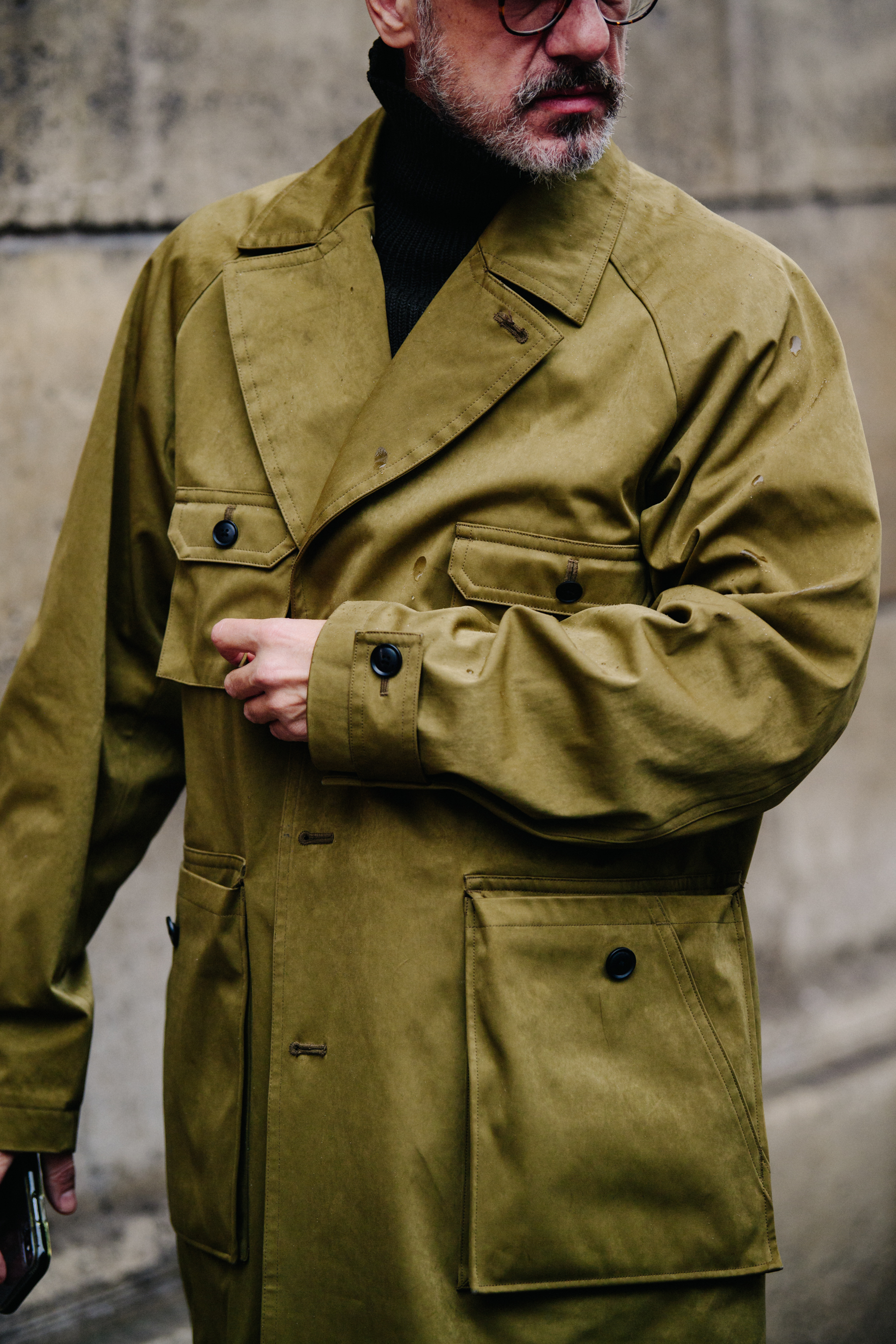 Man wearing light green jacket