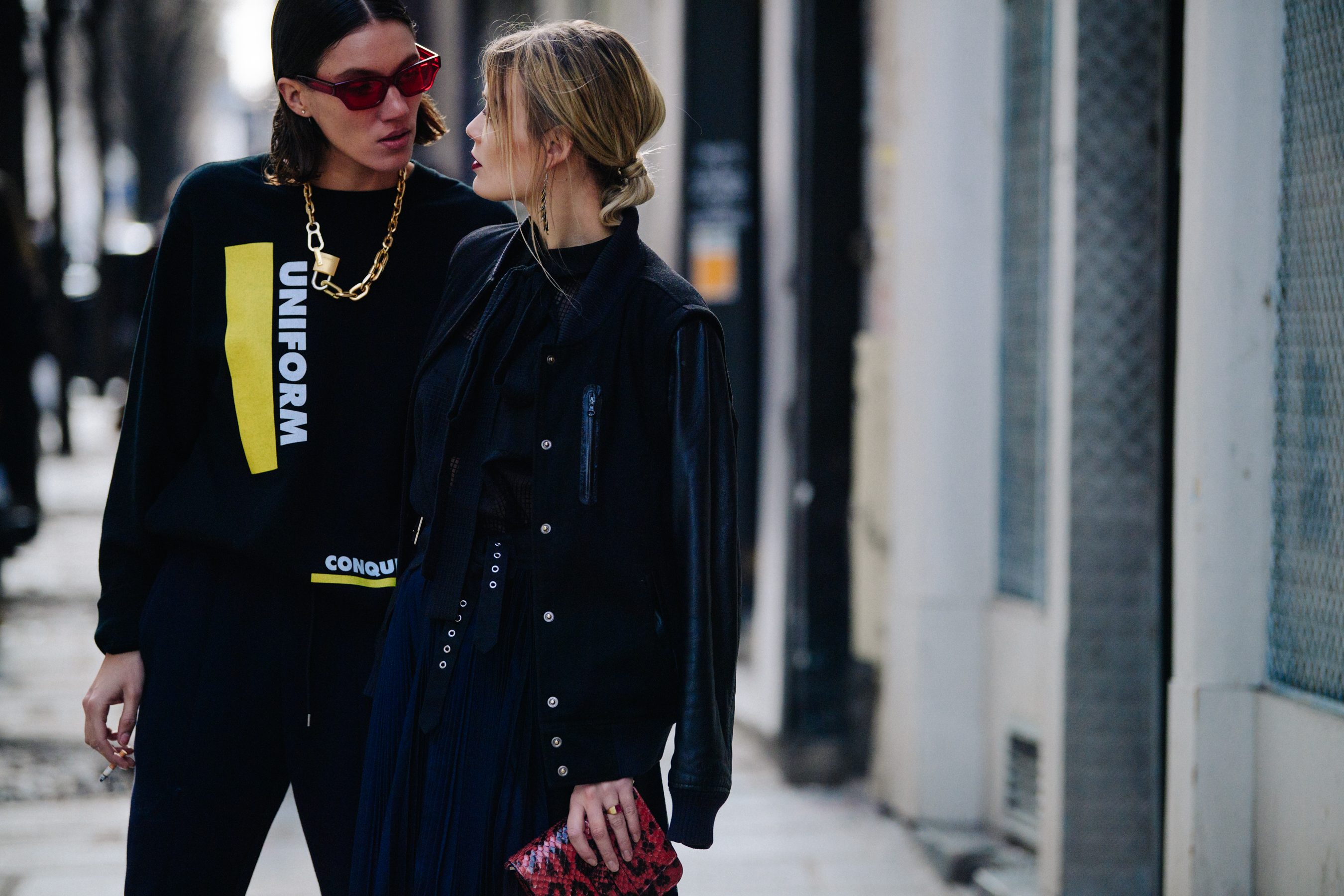Couple wearing dark outfits