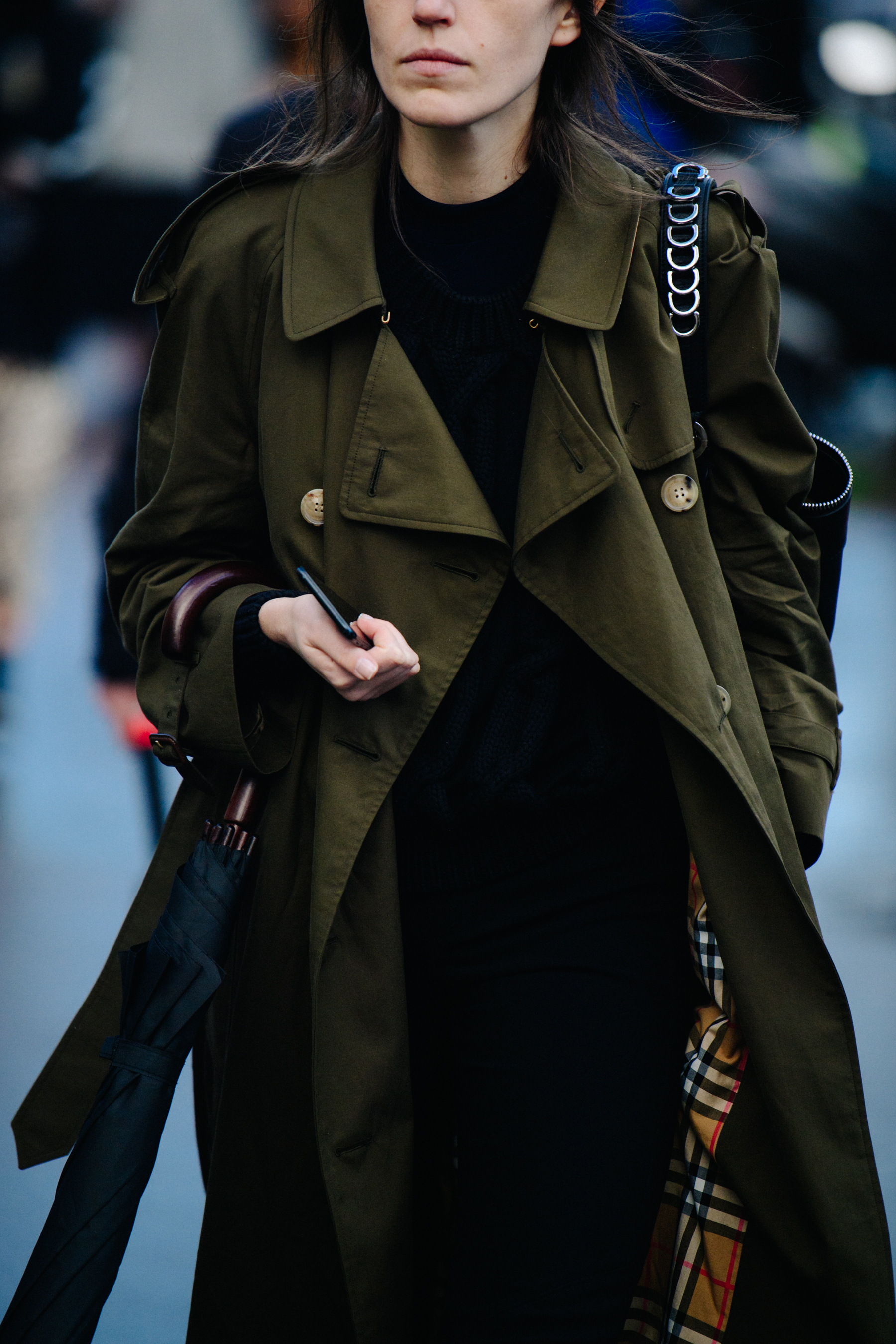 Woman wearing green overcoat