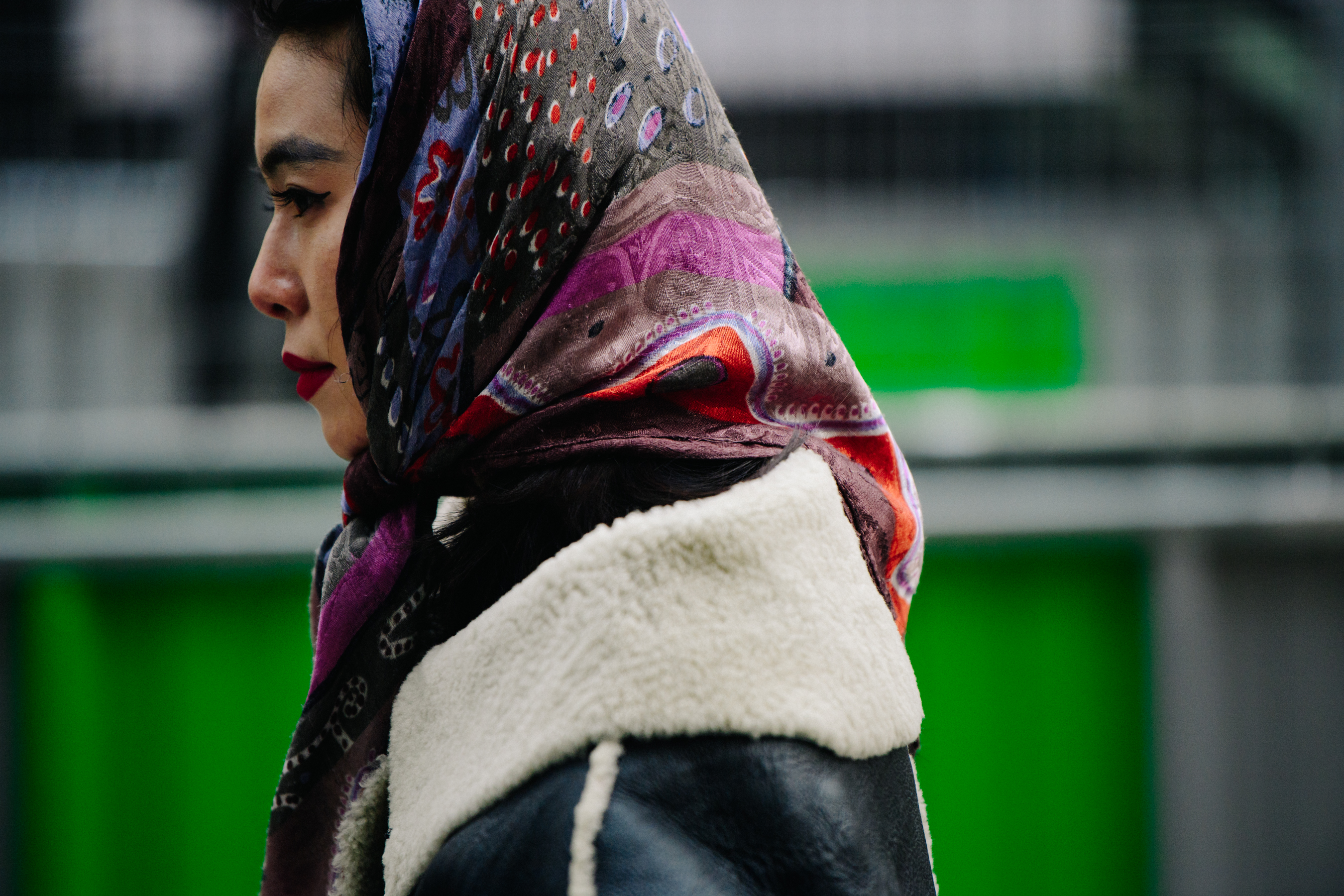 Asian woman wearing colourful headscarf