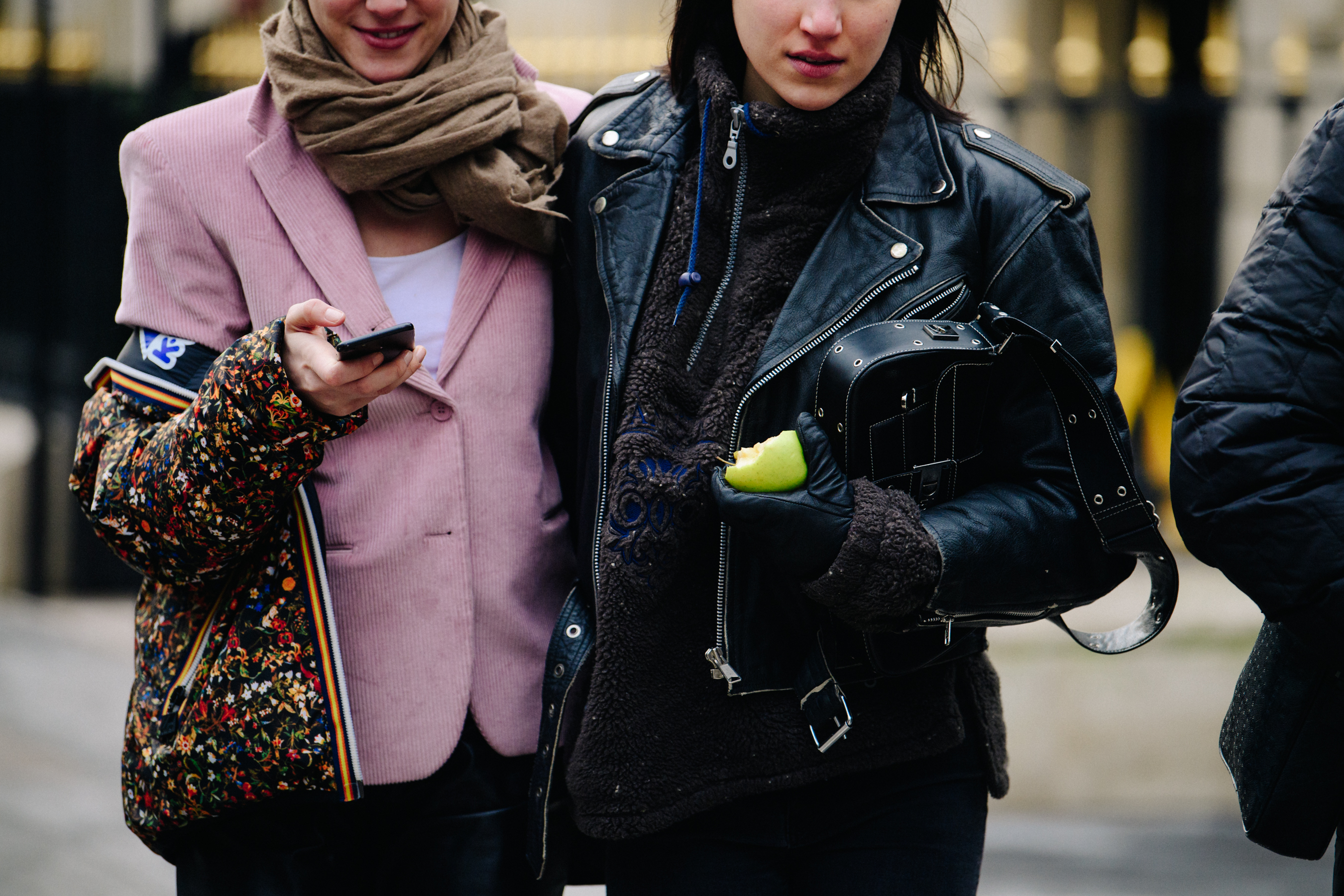 Two models wearing light jackets