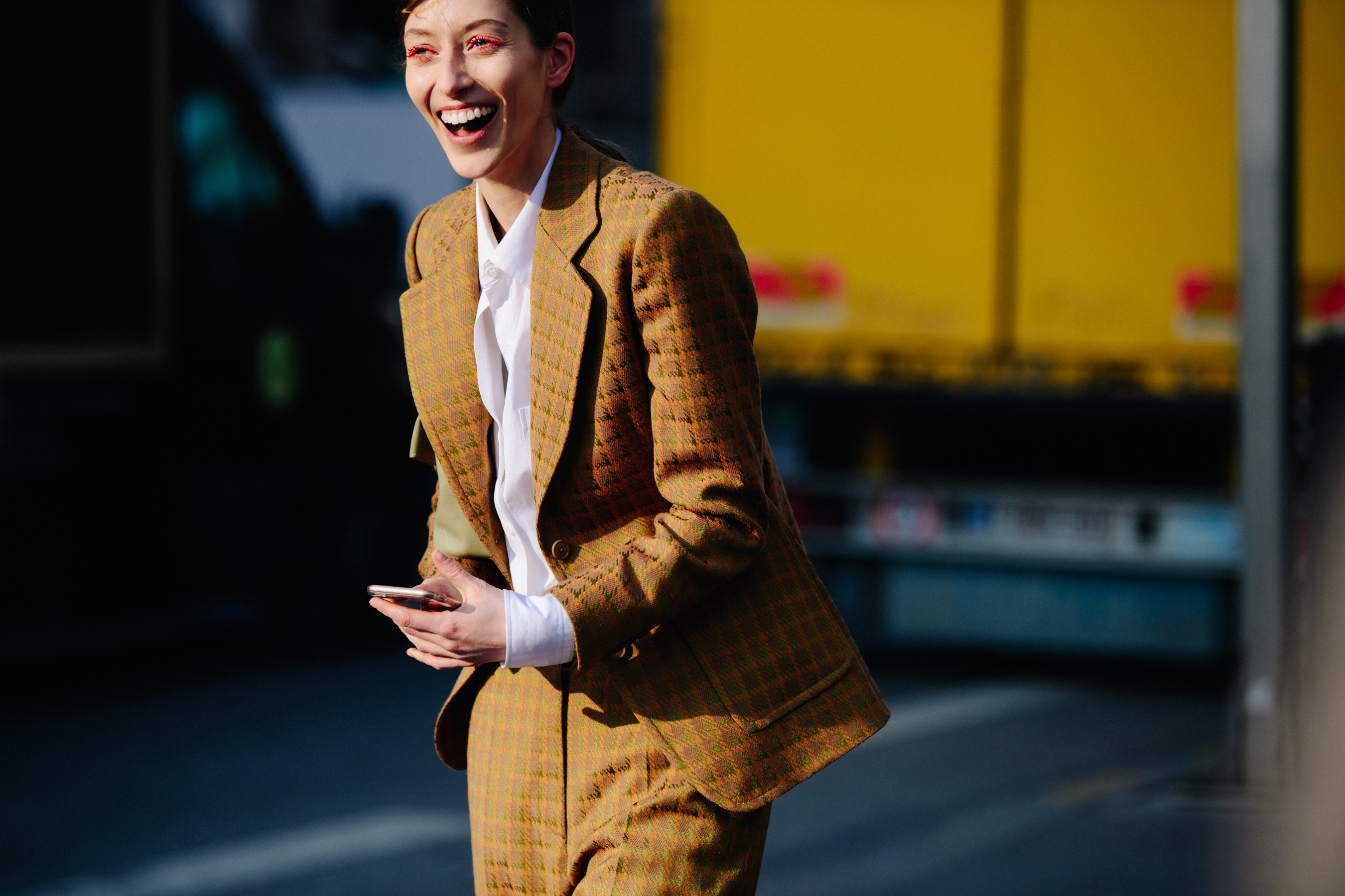 Model wearing yellow check suit