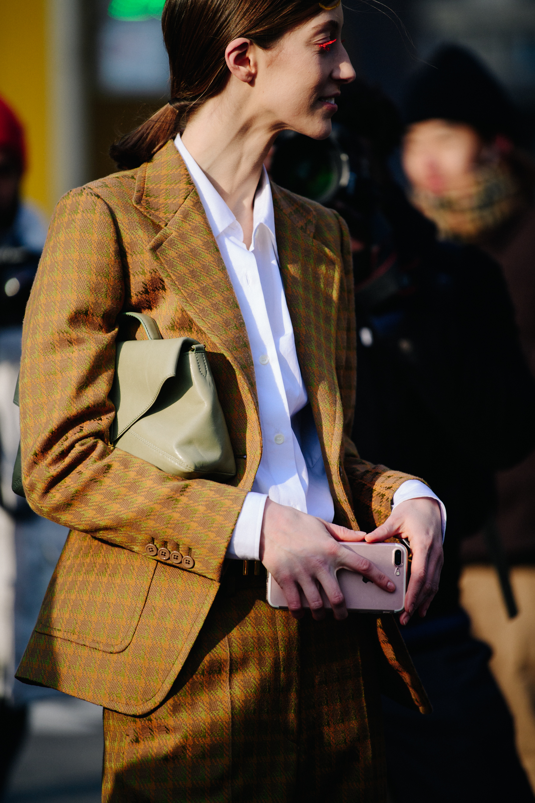 Model wearing yellow check suit