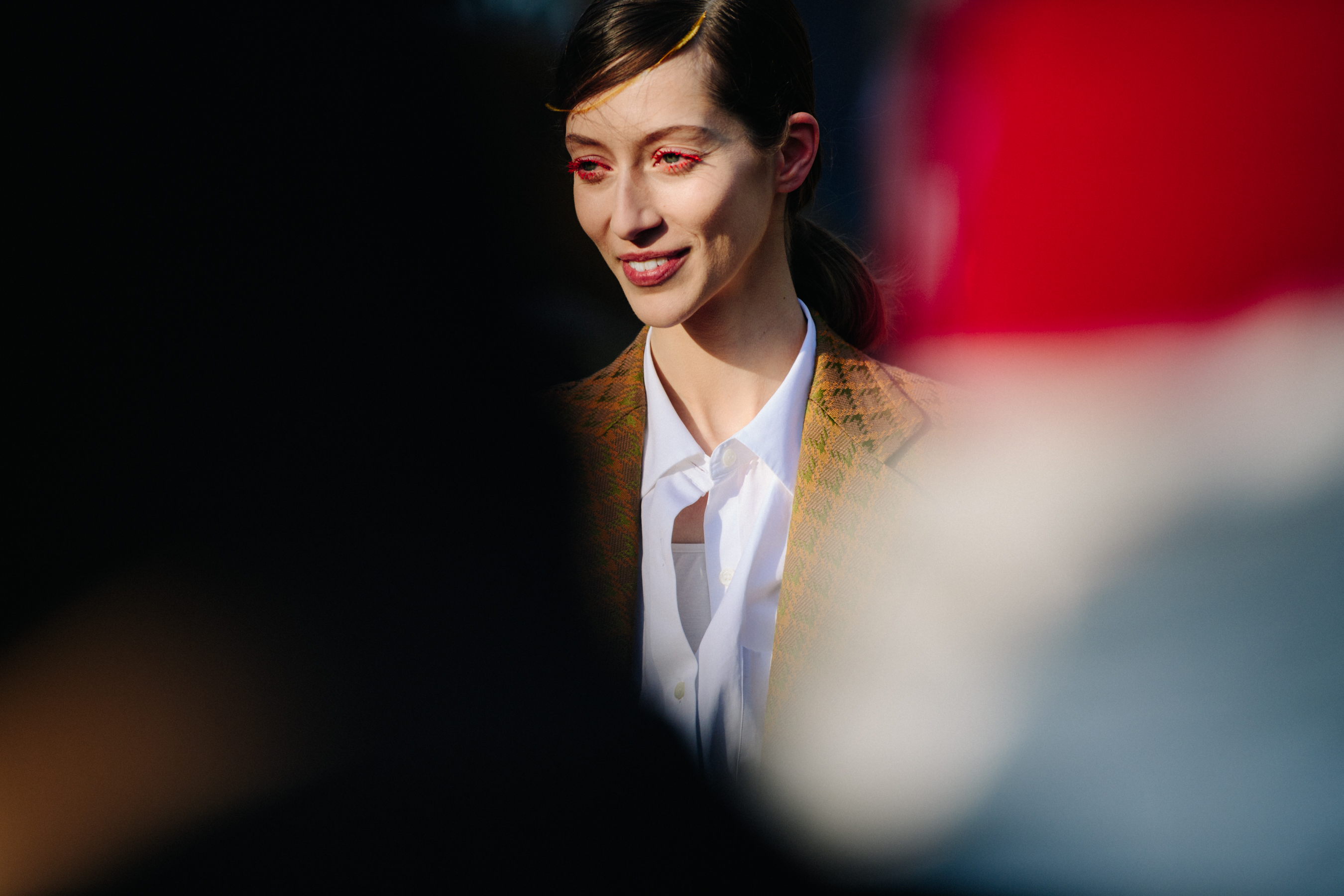 Model wearing yellow check suit