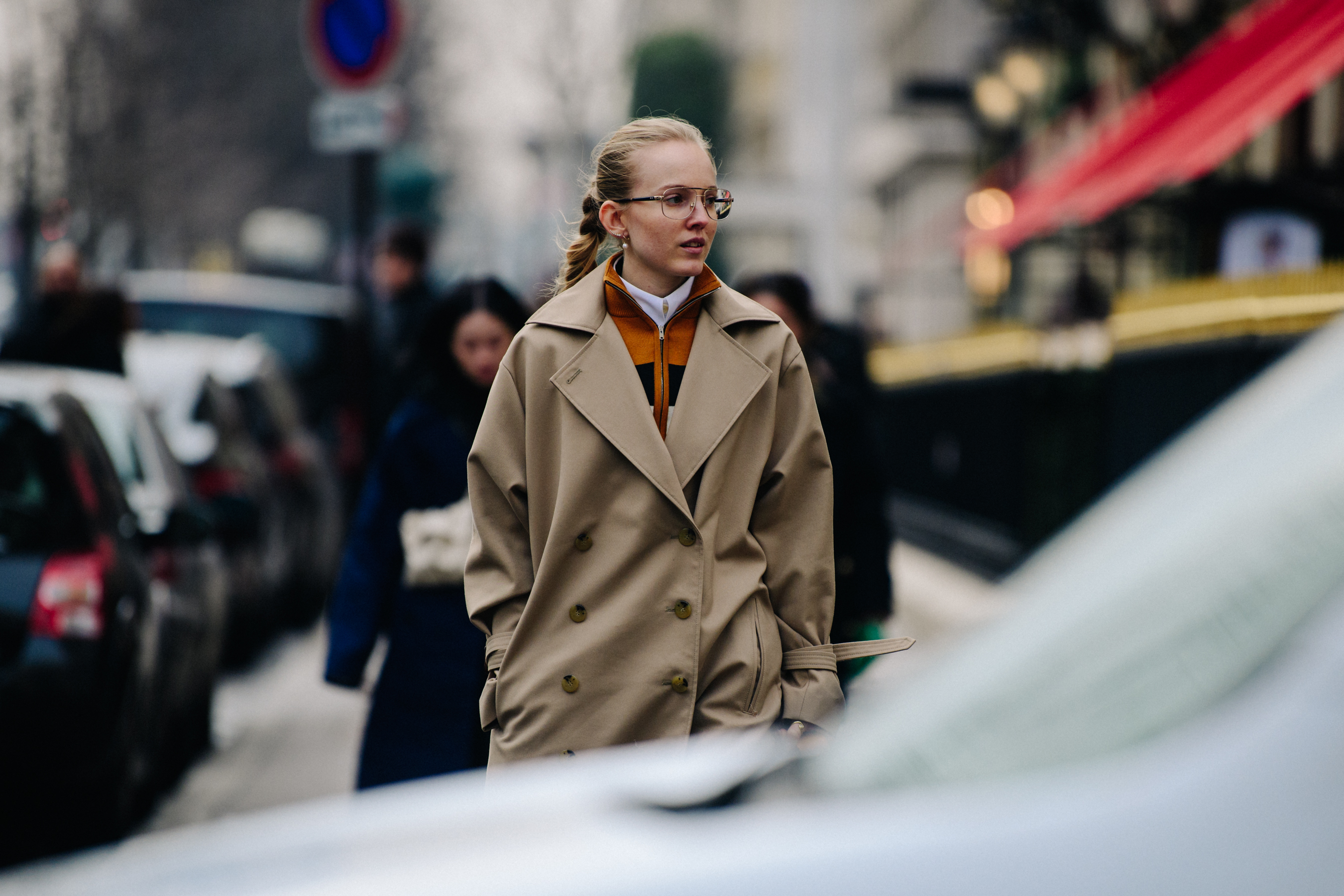 Danish woman wearing long tan coat