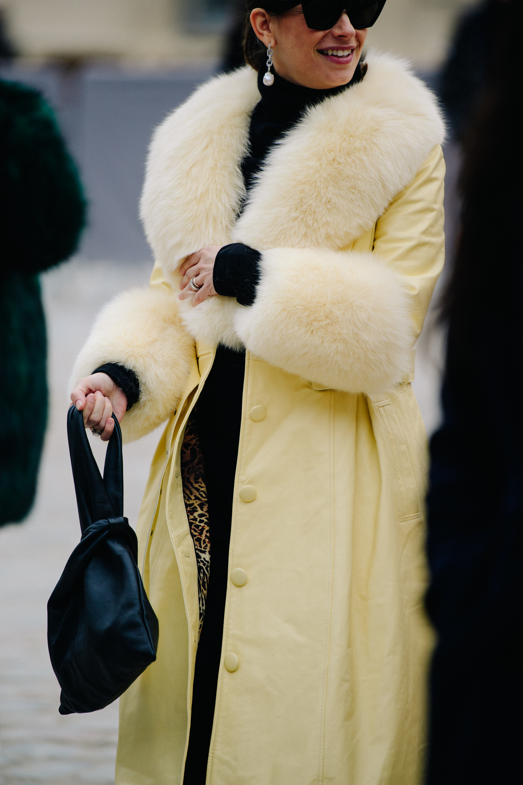 Woman wearing pale fur coat