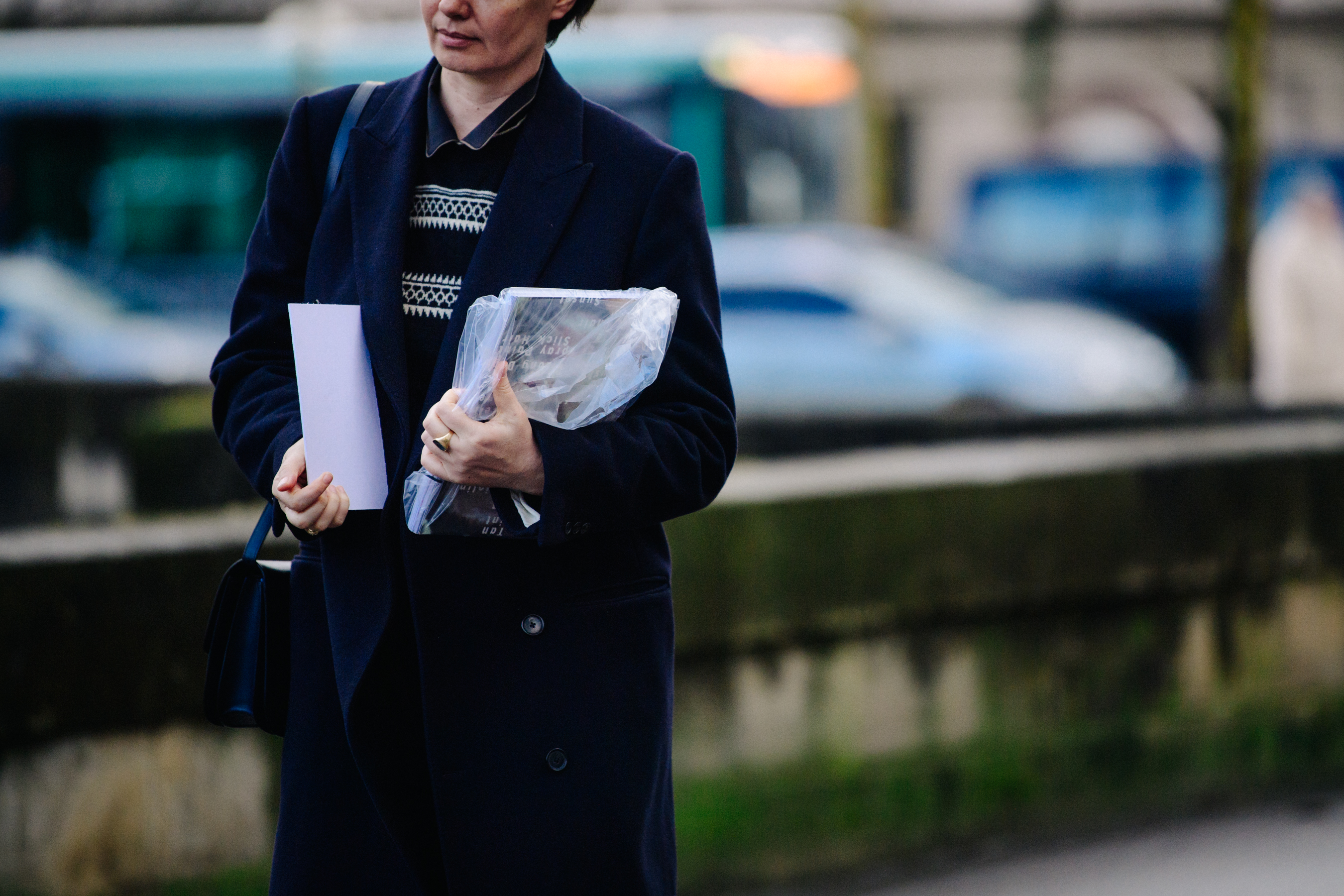 Woman wearing blue wool coat