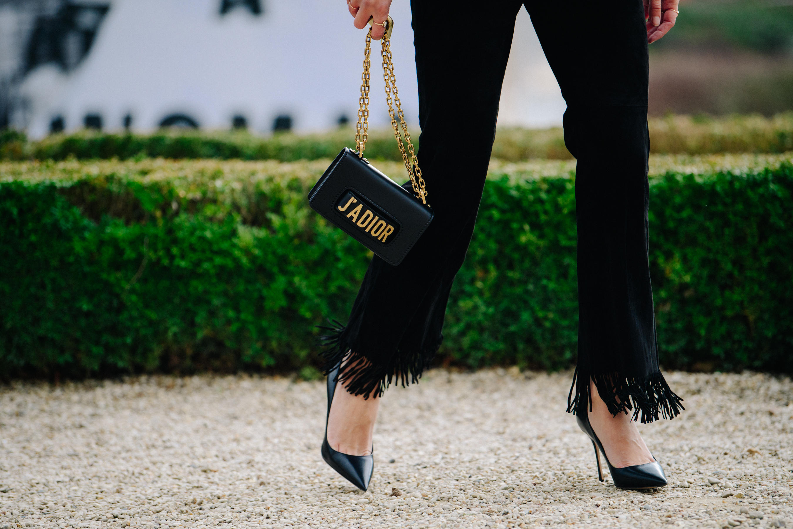 Woman carrying Dior bag