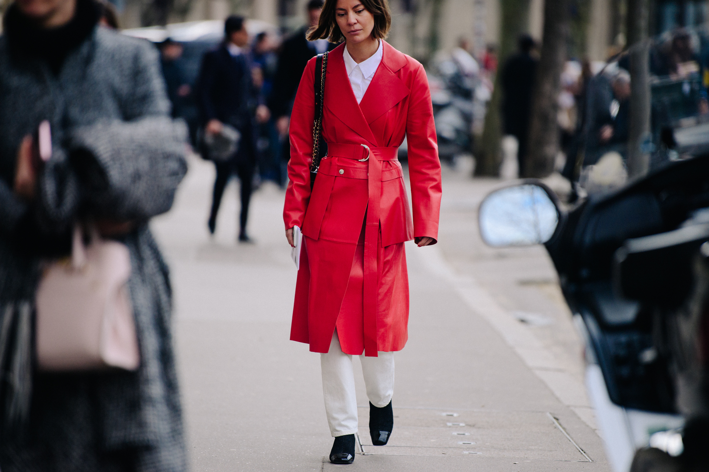 Woman wearing long red coat