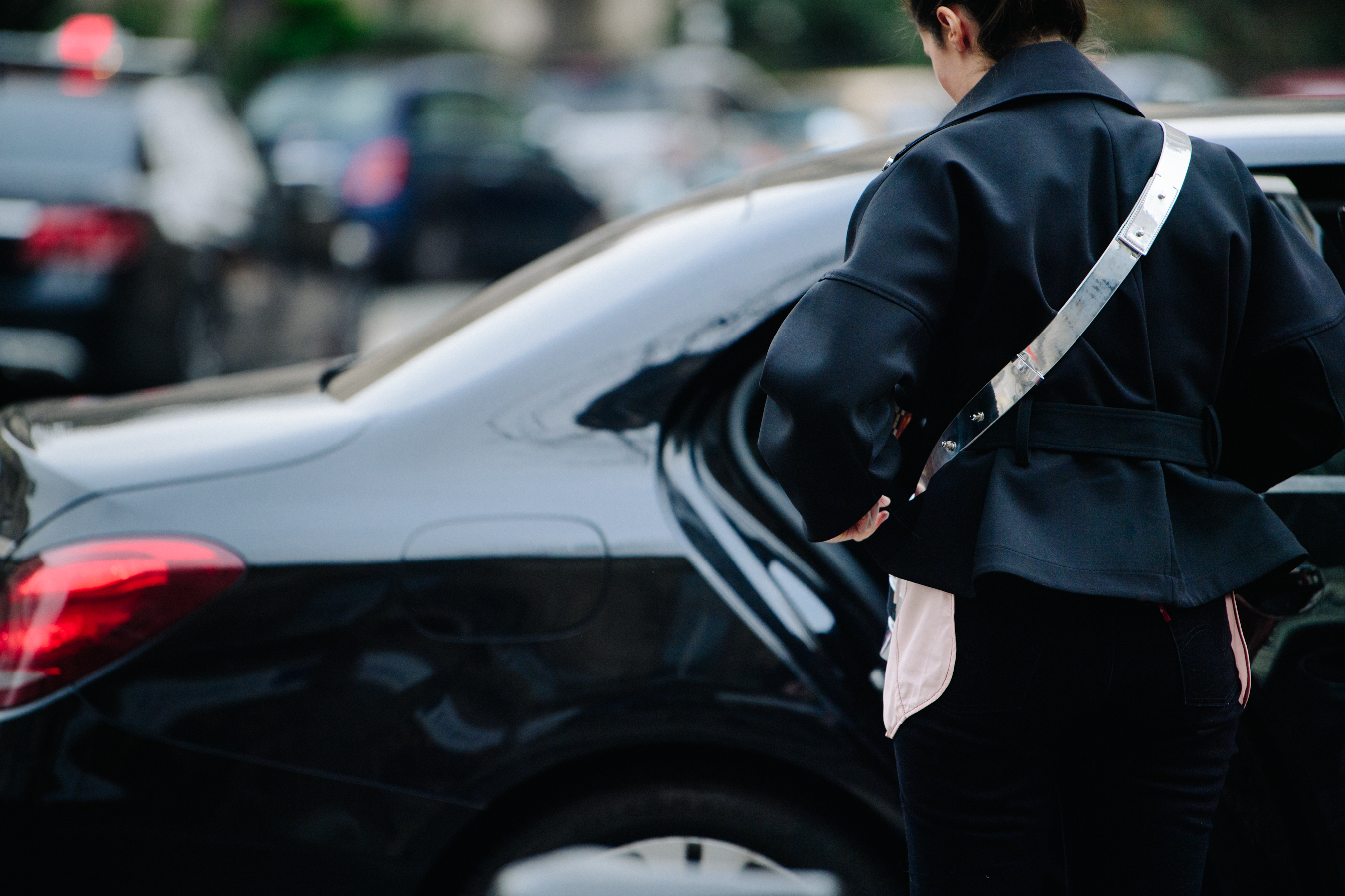 Woman wearing black wool jacket