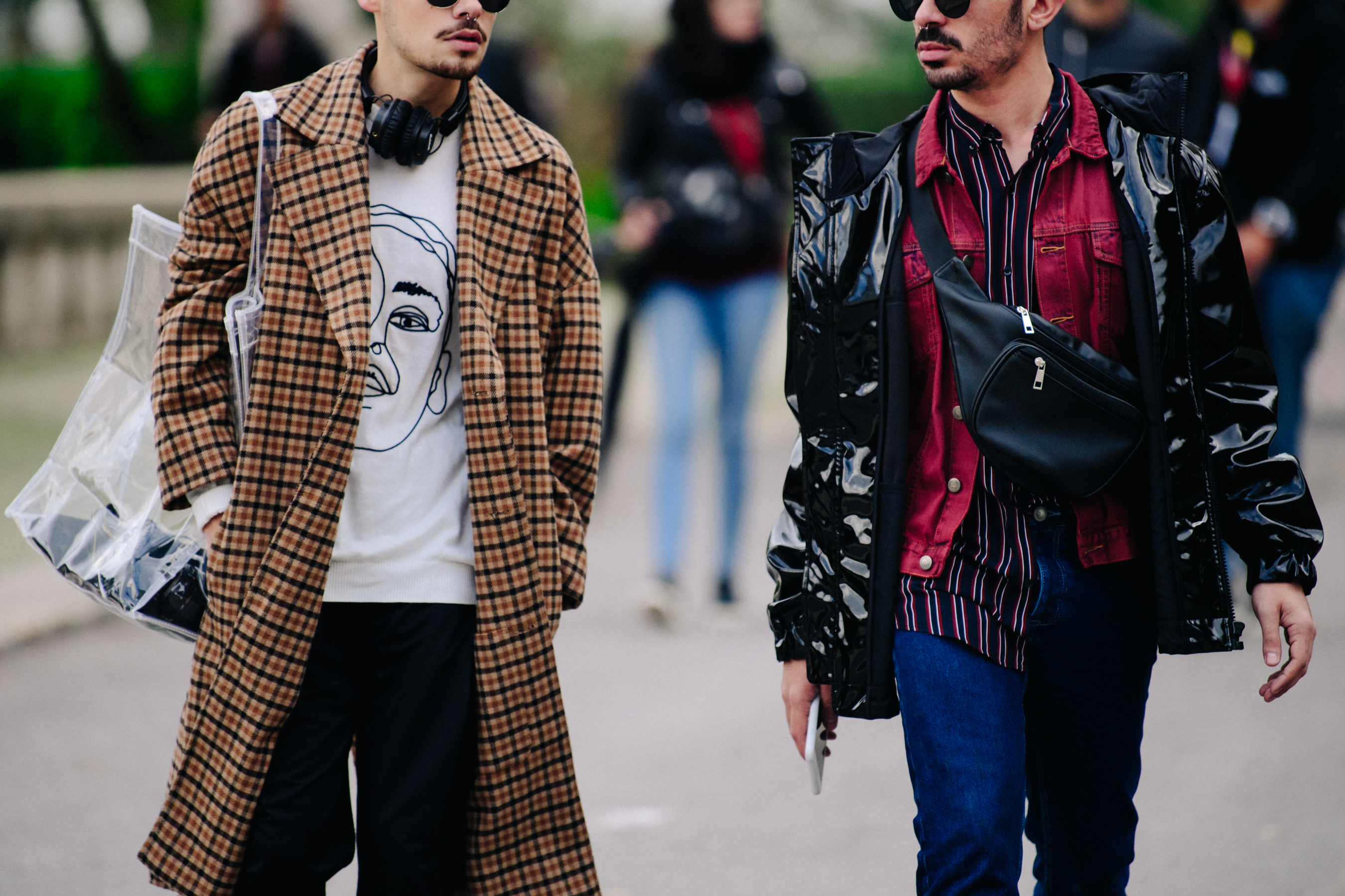 Two men wearing black sunglasses