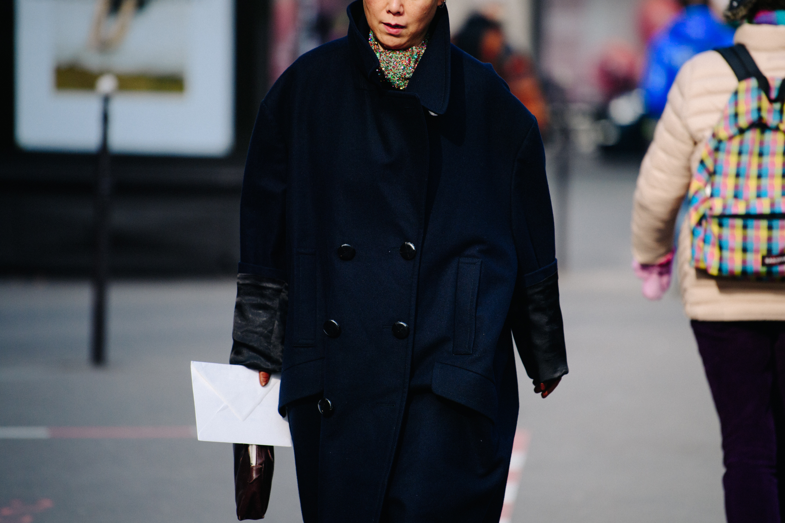 Woman wearing black wool coat