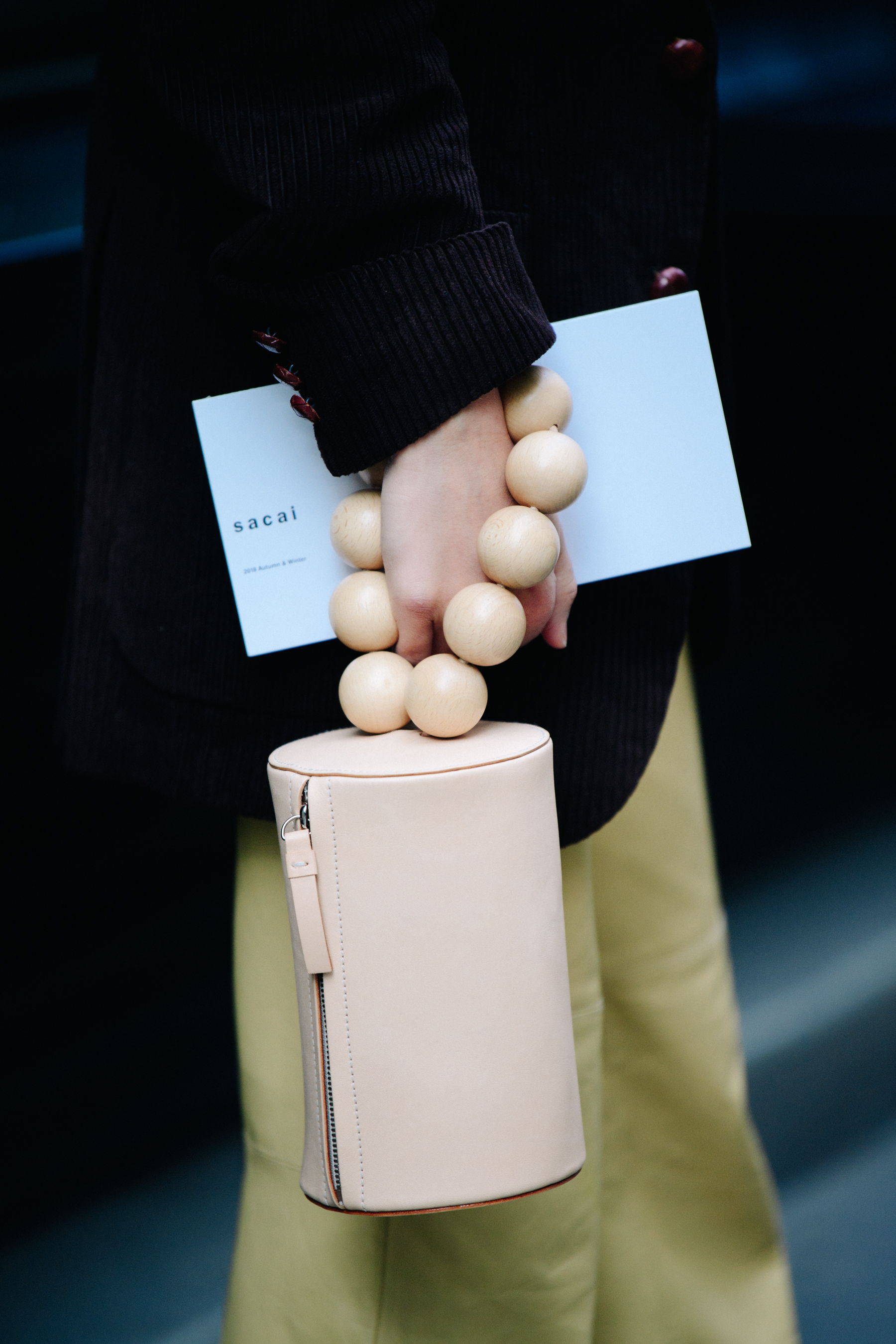 Woman carrying pink bag