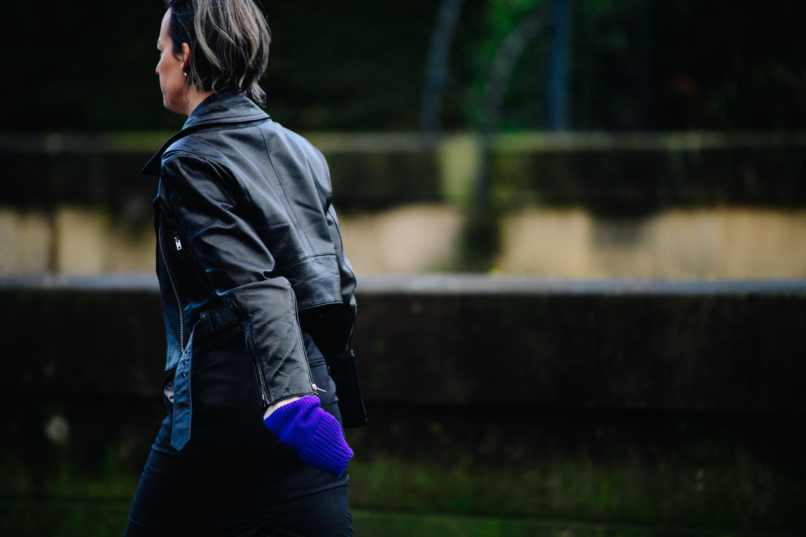 Woman wearing black leather jacket