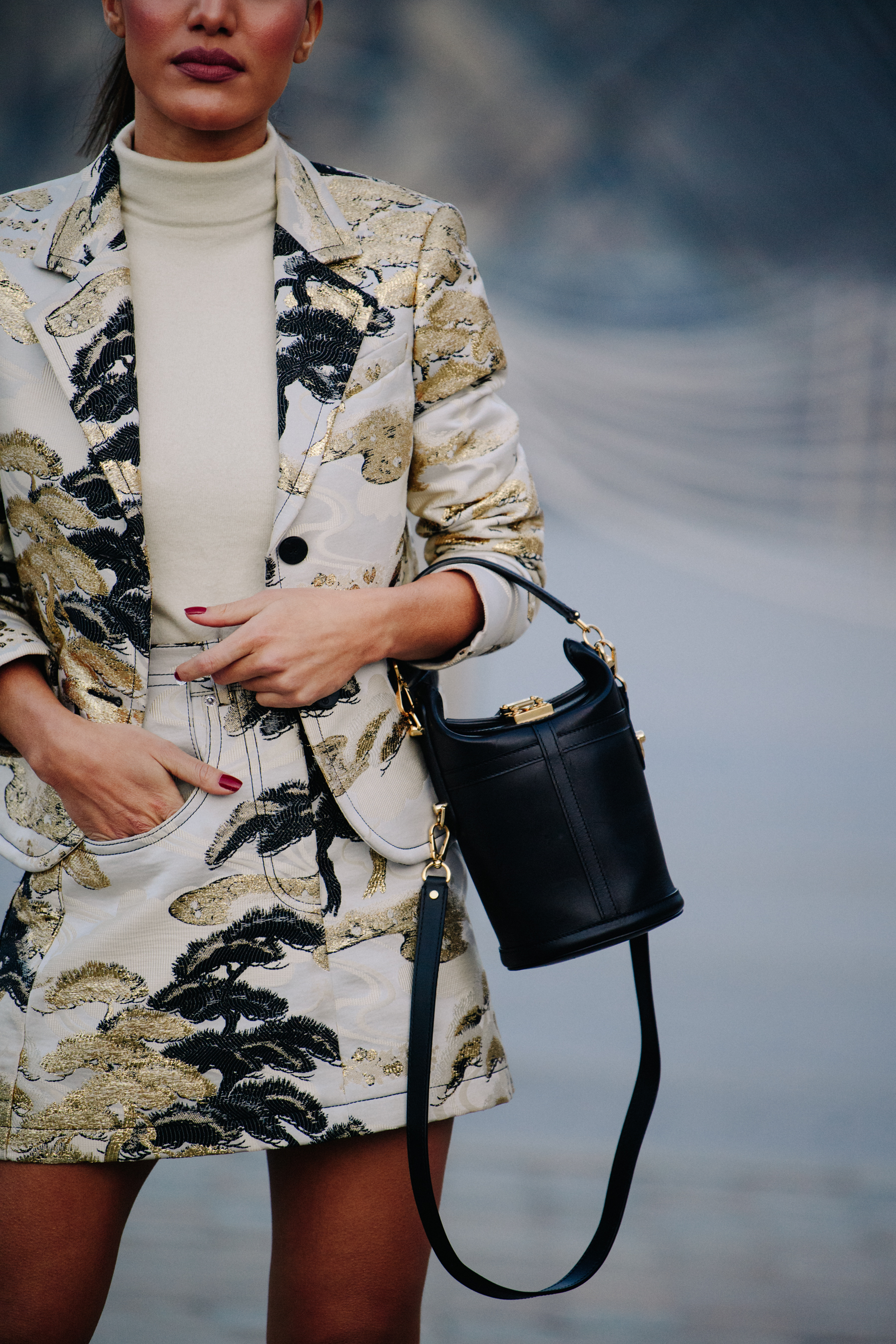 Blogger wearing gold pattern outfit