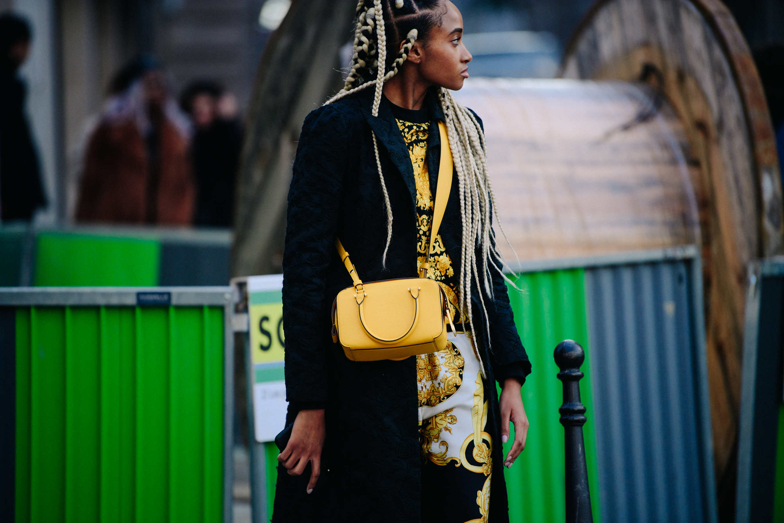 American woman carrying Delvaux bag