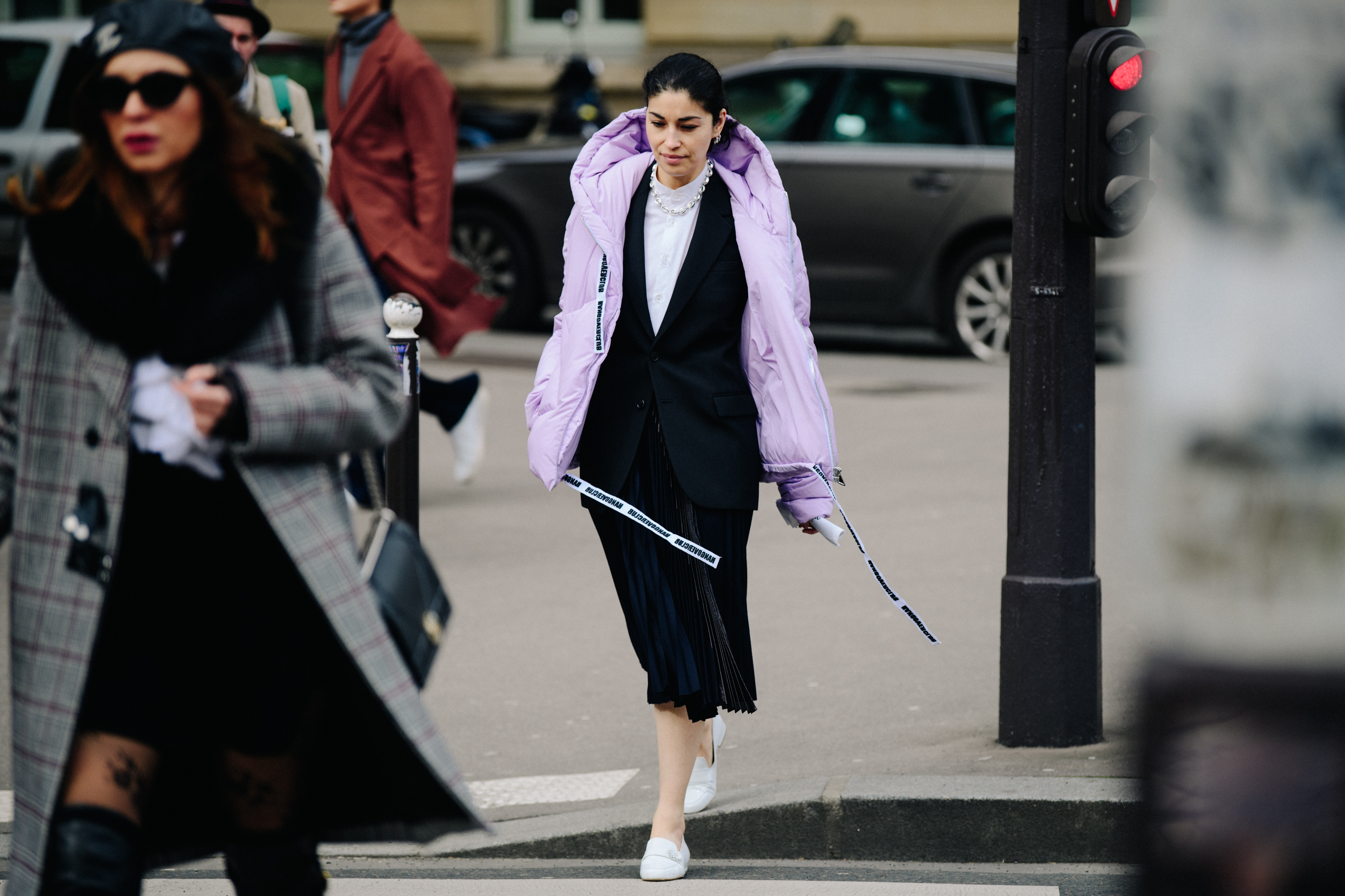 Woman wearing light purple coat