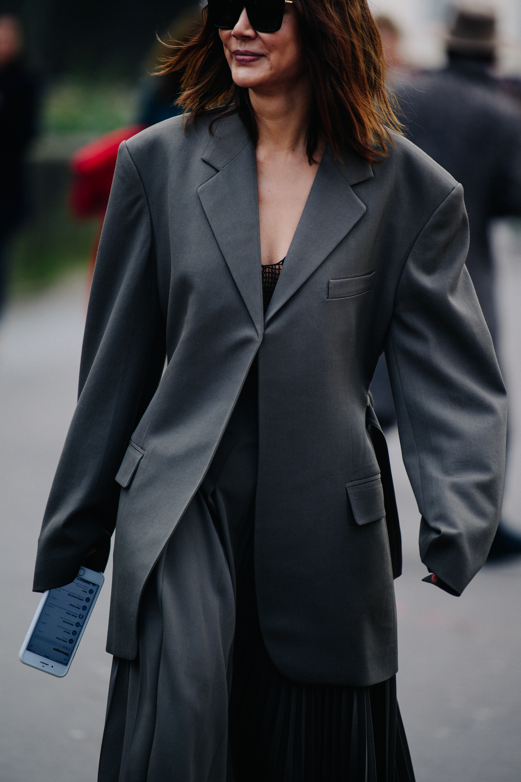 Woman wearing long grey dress