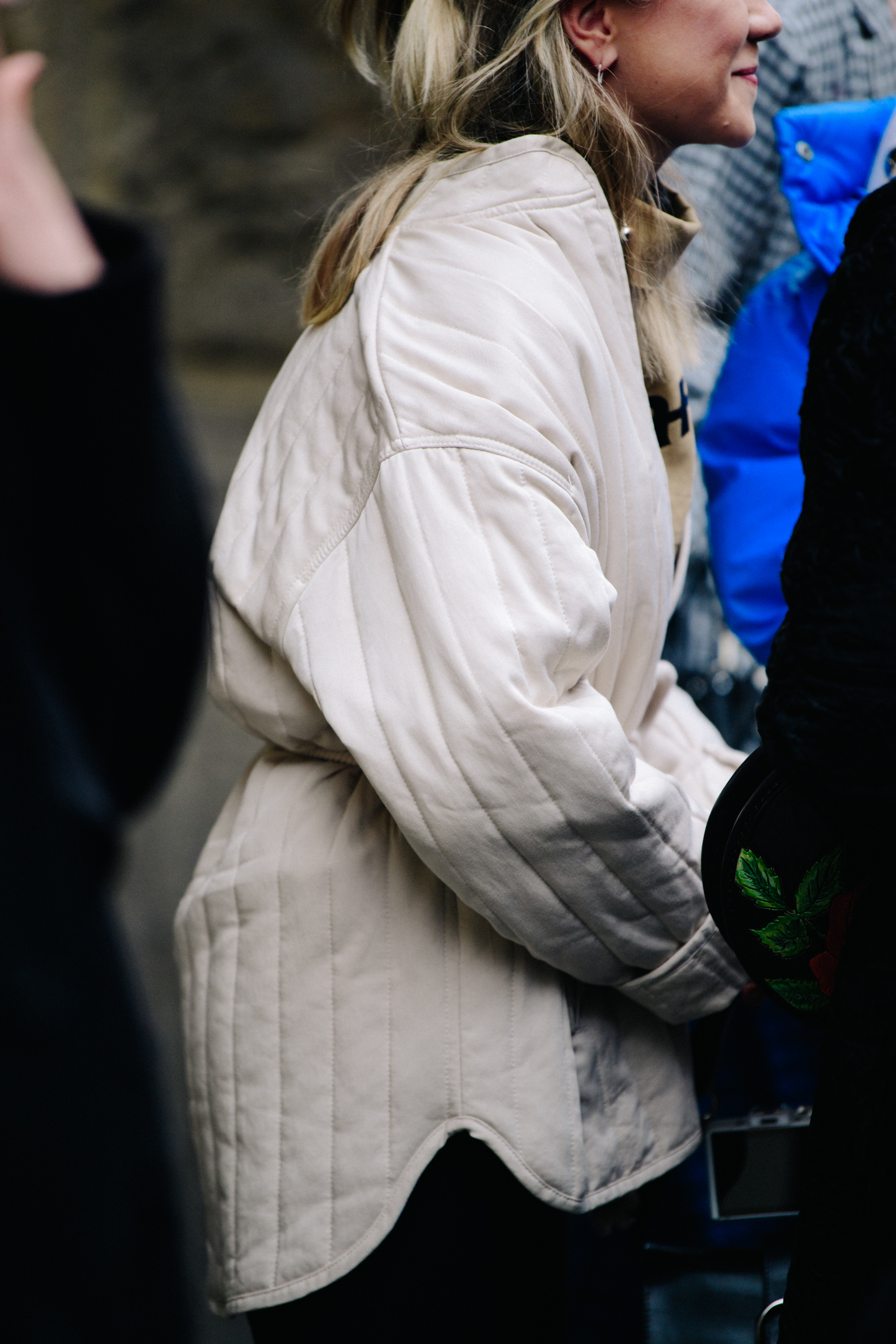 Woman wearing white jacket