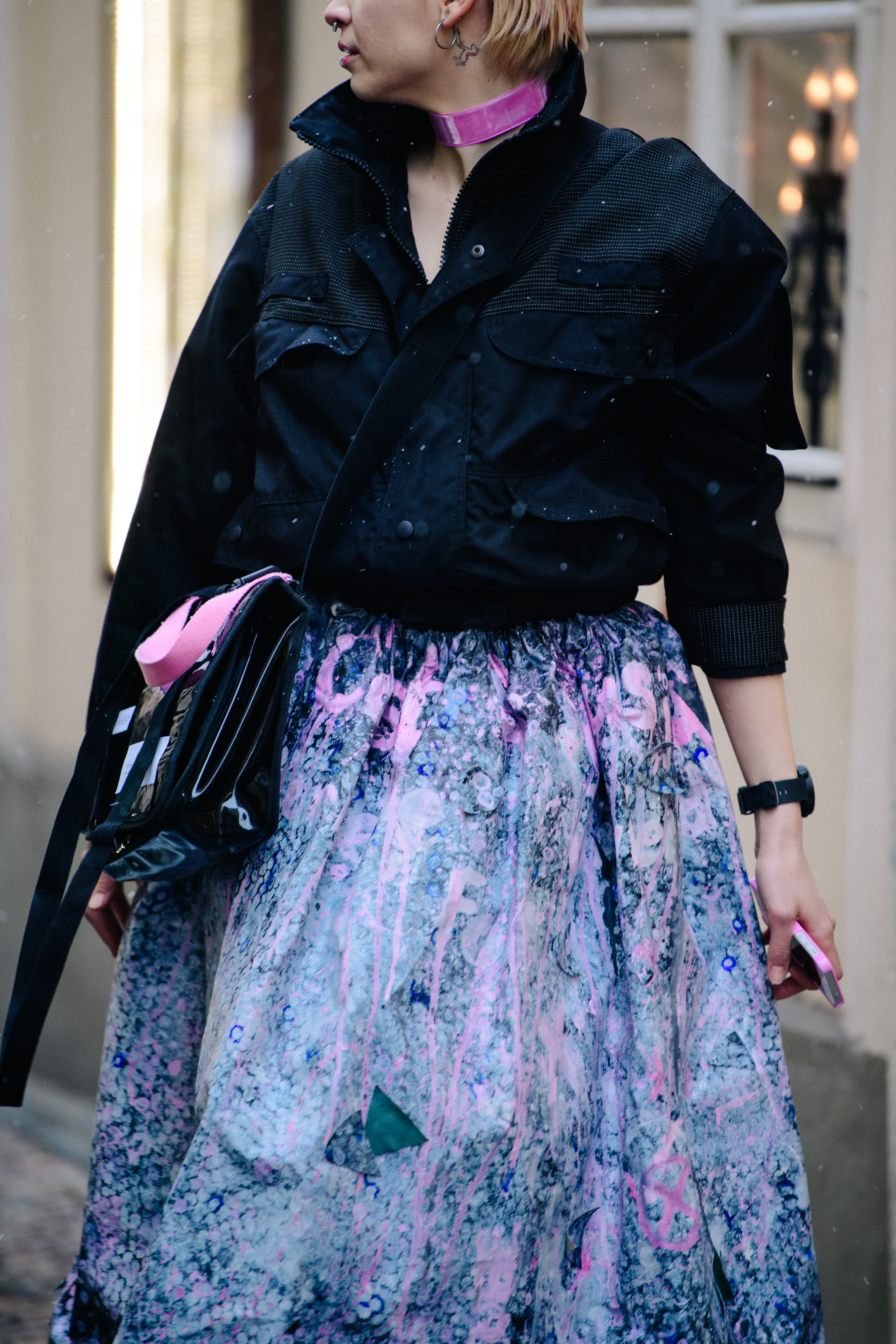 Woman wearing pink and blue skirt