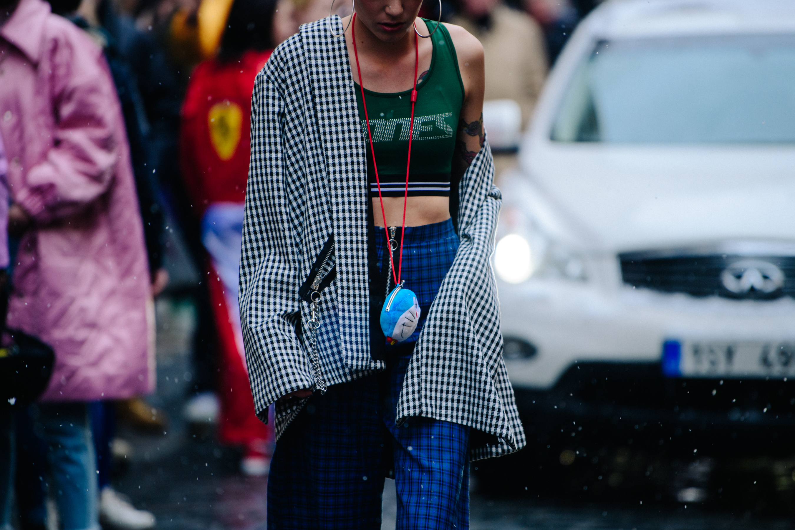 Woman wearing green vest