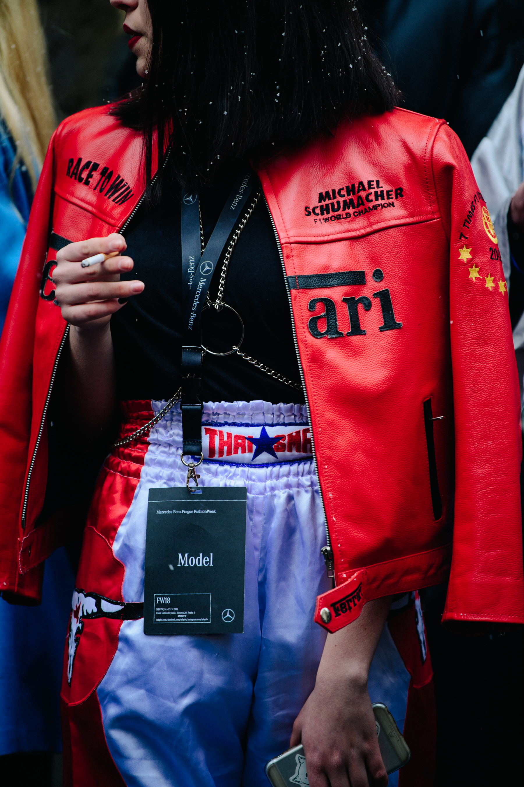 Woman wearing red leather jacket