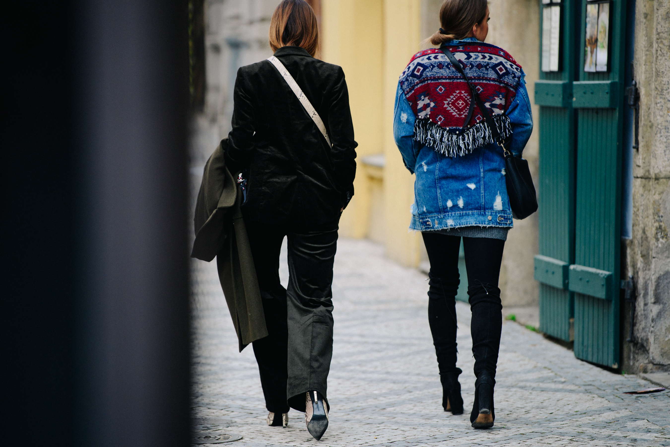 Two women wearing heels