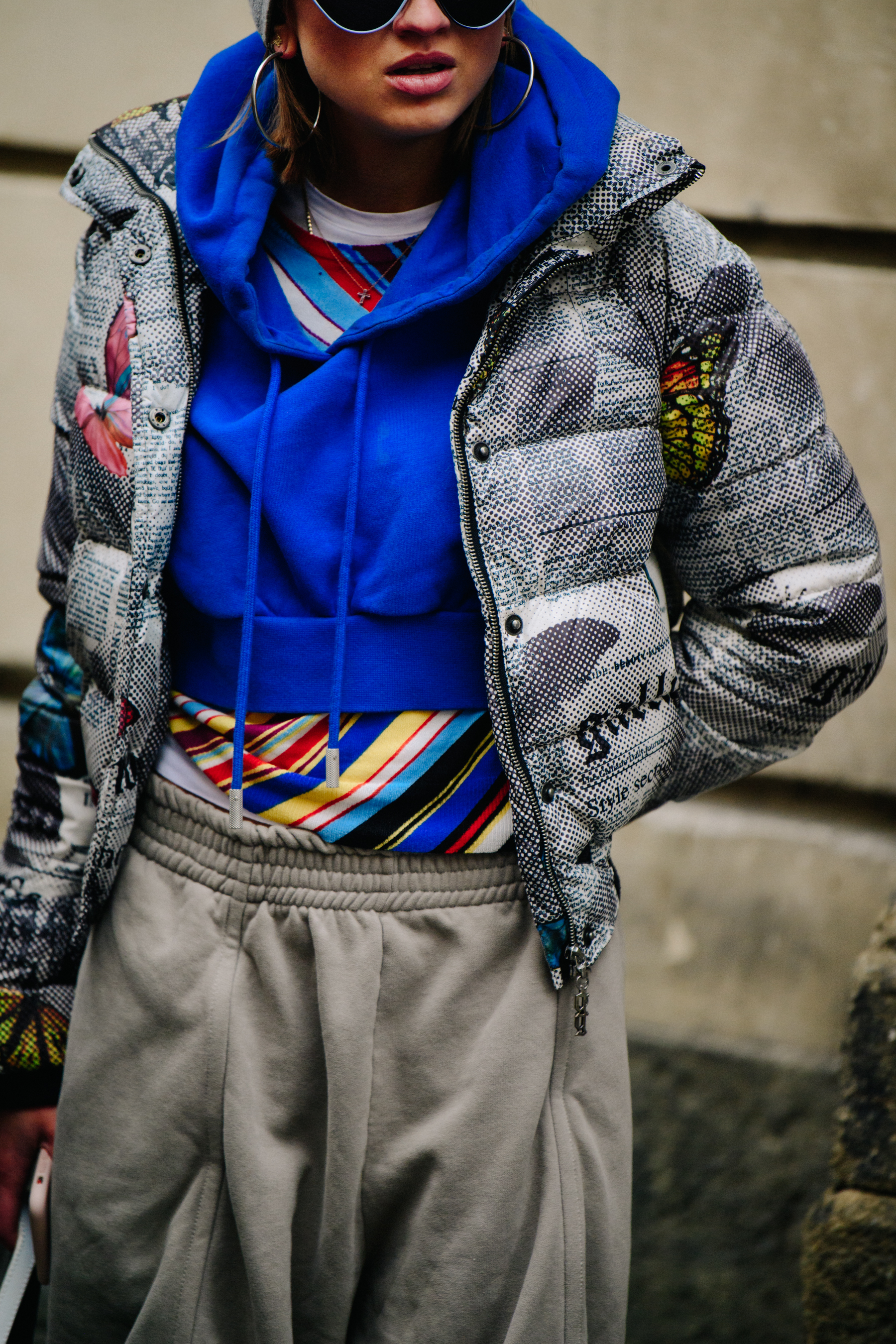 Woman wearing blue crop hoodie