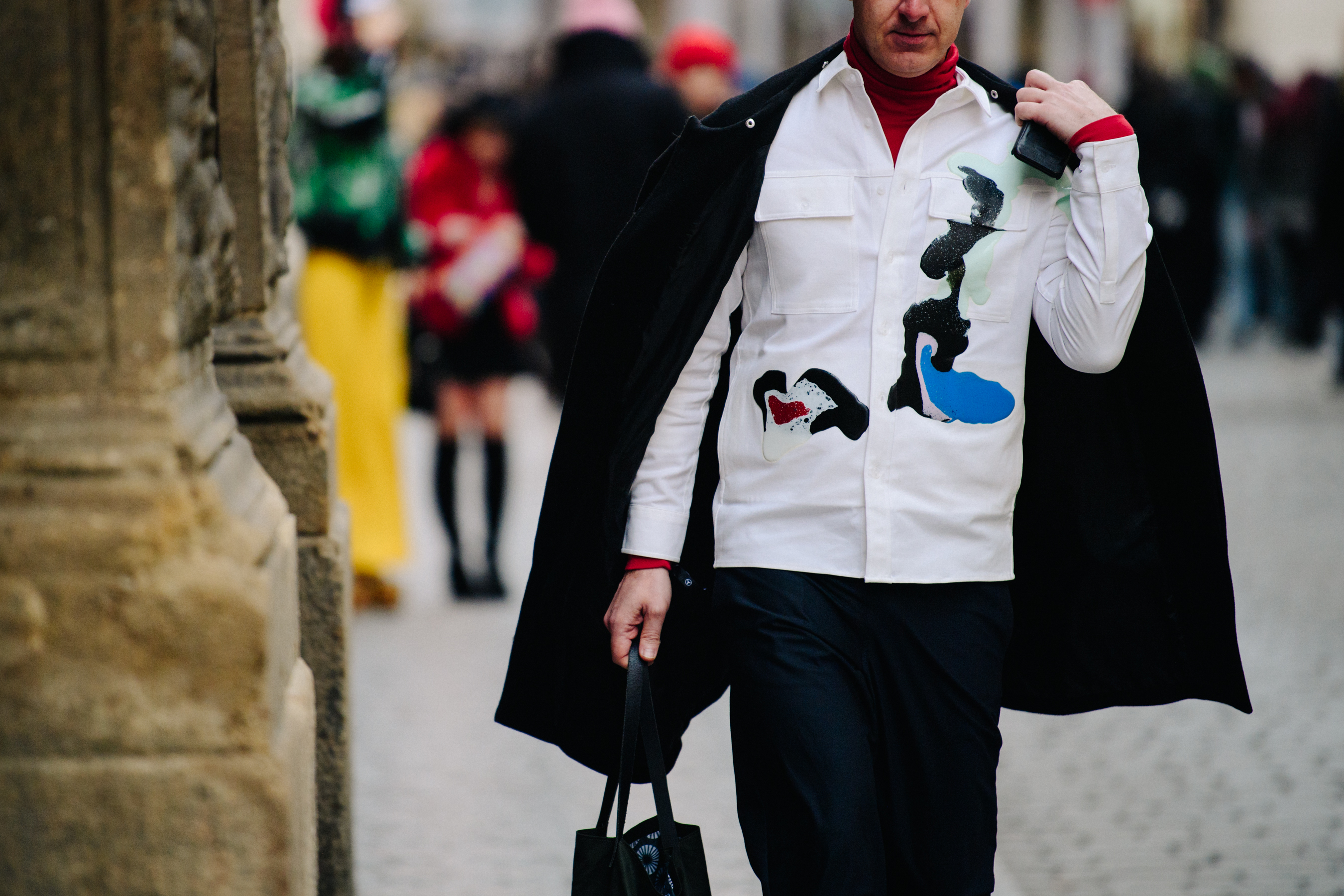 Man wearing white denim shirt