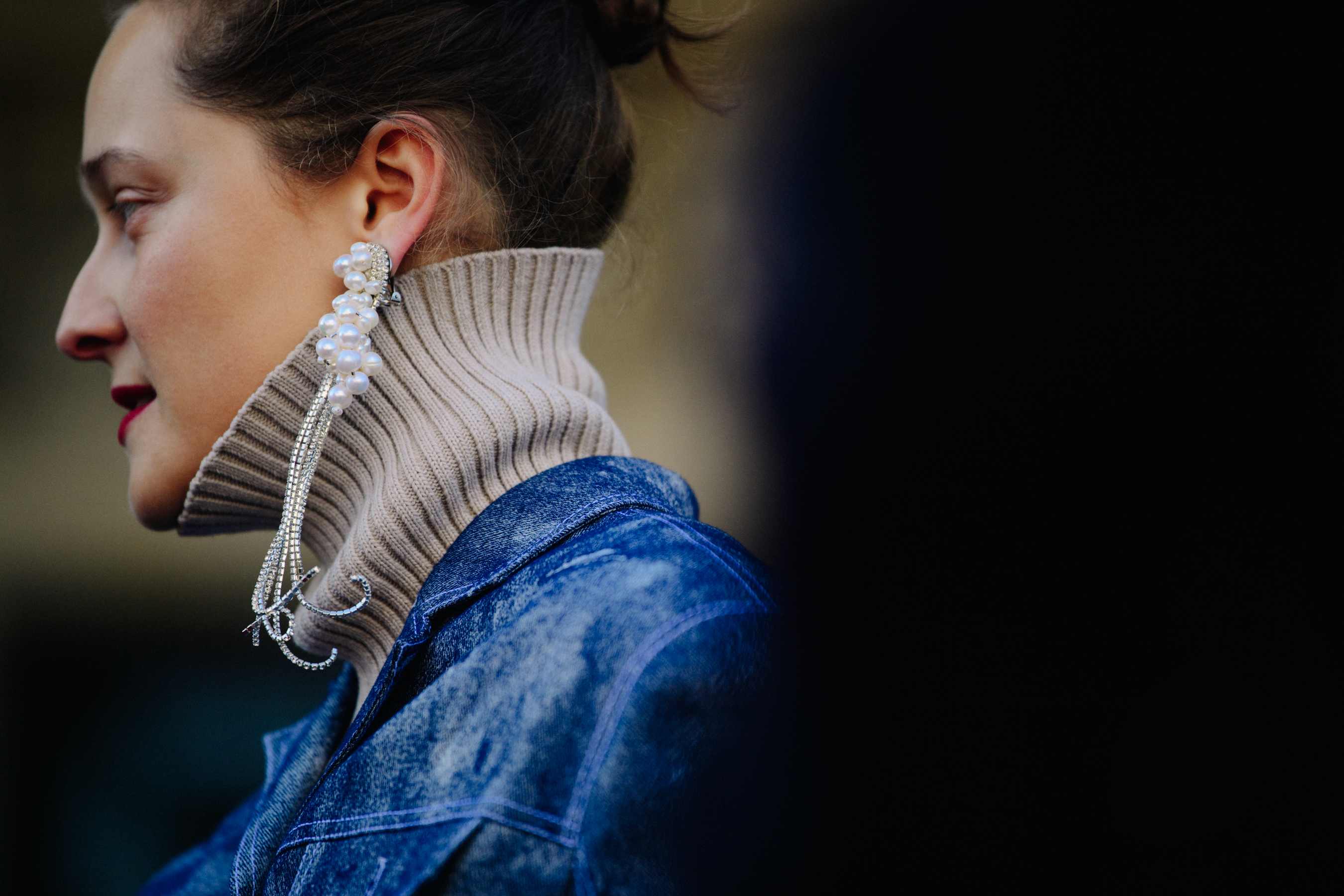 Russian woman wearing long silver earring