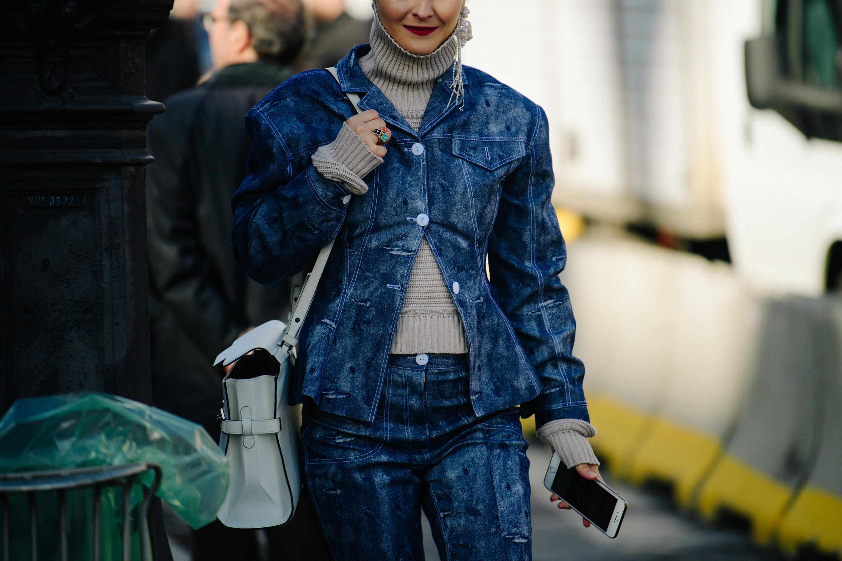 Russian woman wearing denim jacket and jeans