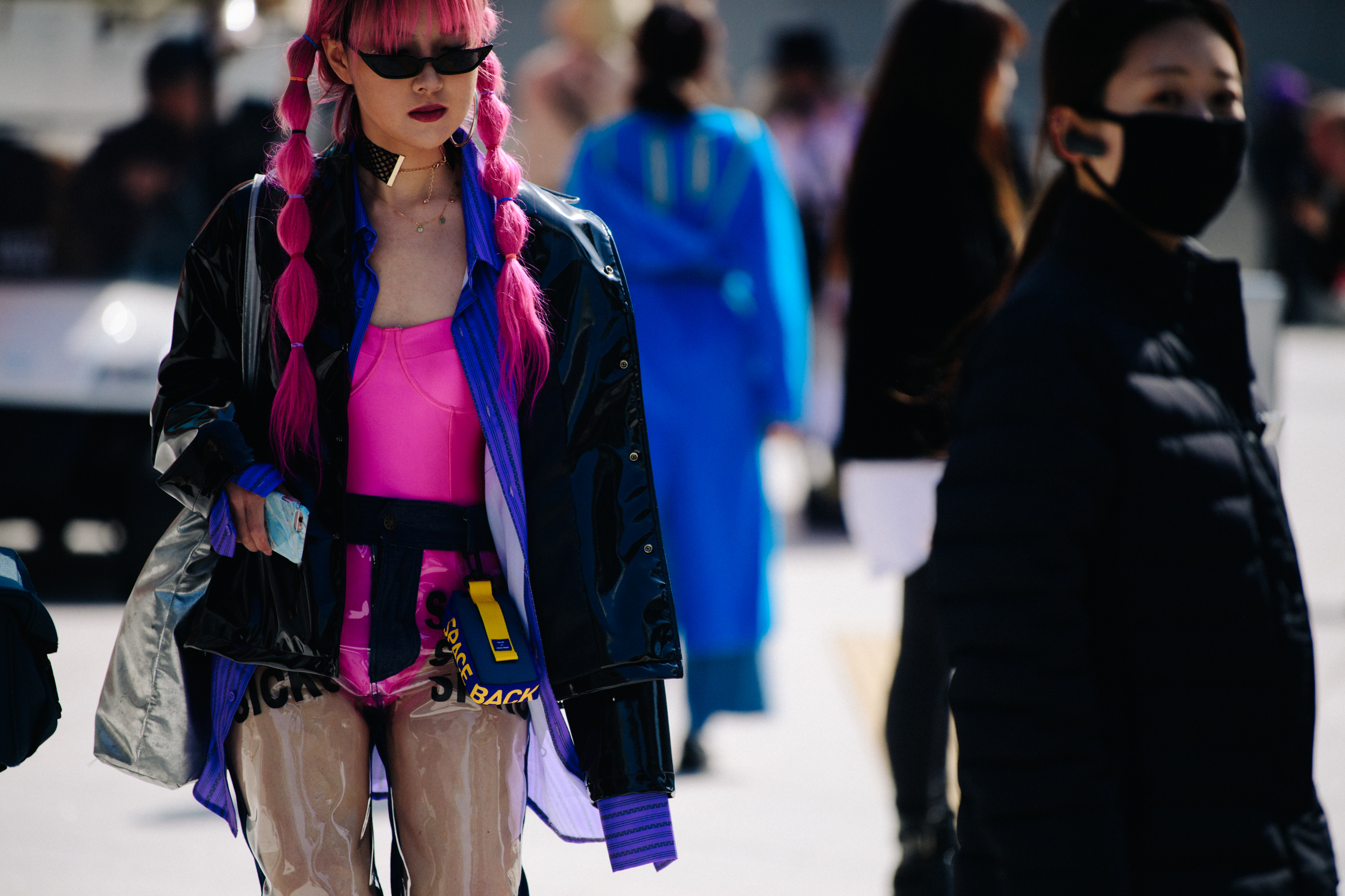 Asian woman with long pink hair