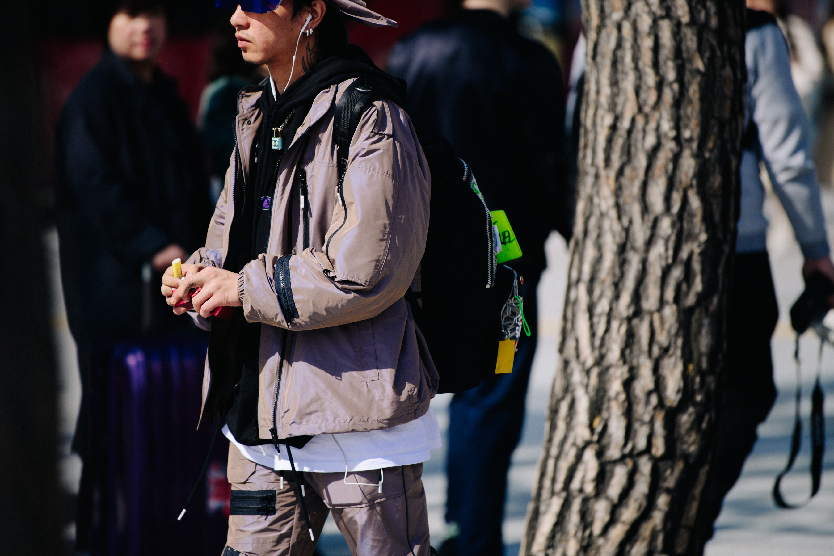 Man wearing purple sunglasses