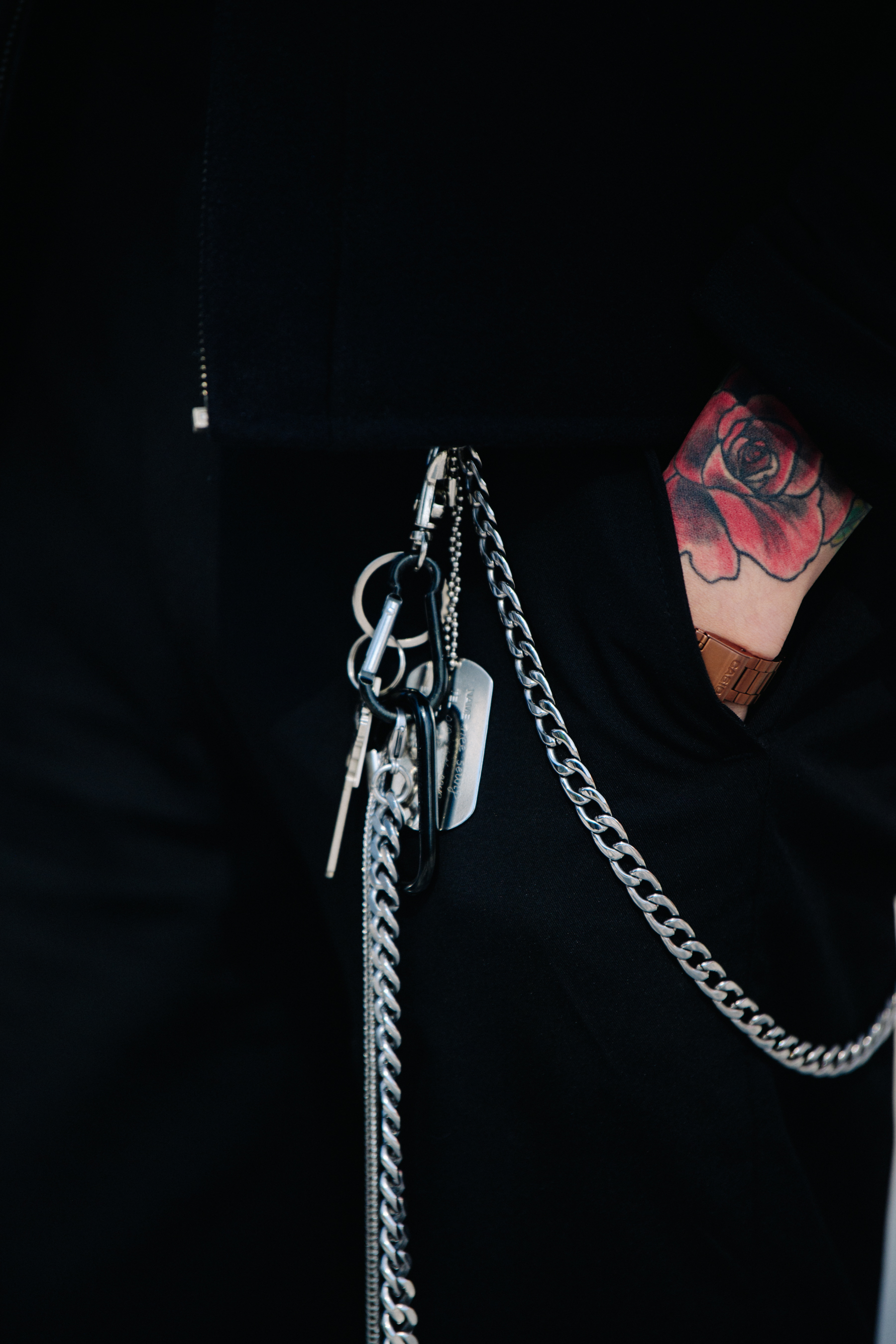 Man with rose tattoo on wrist