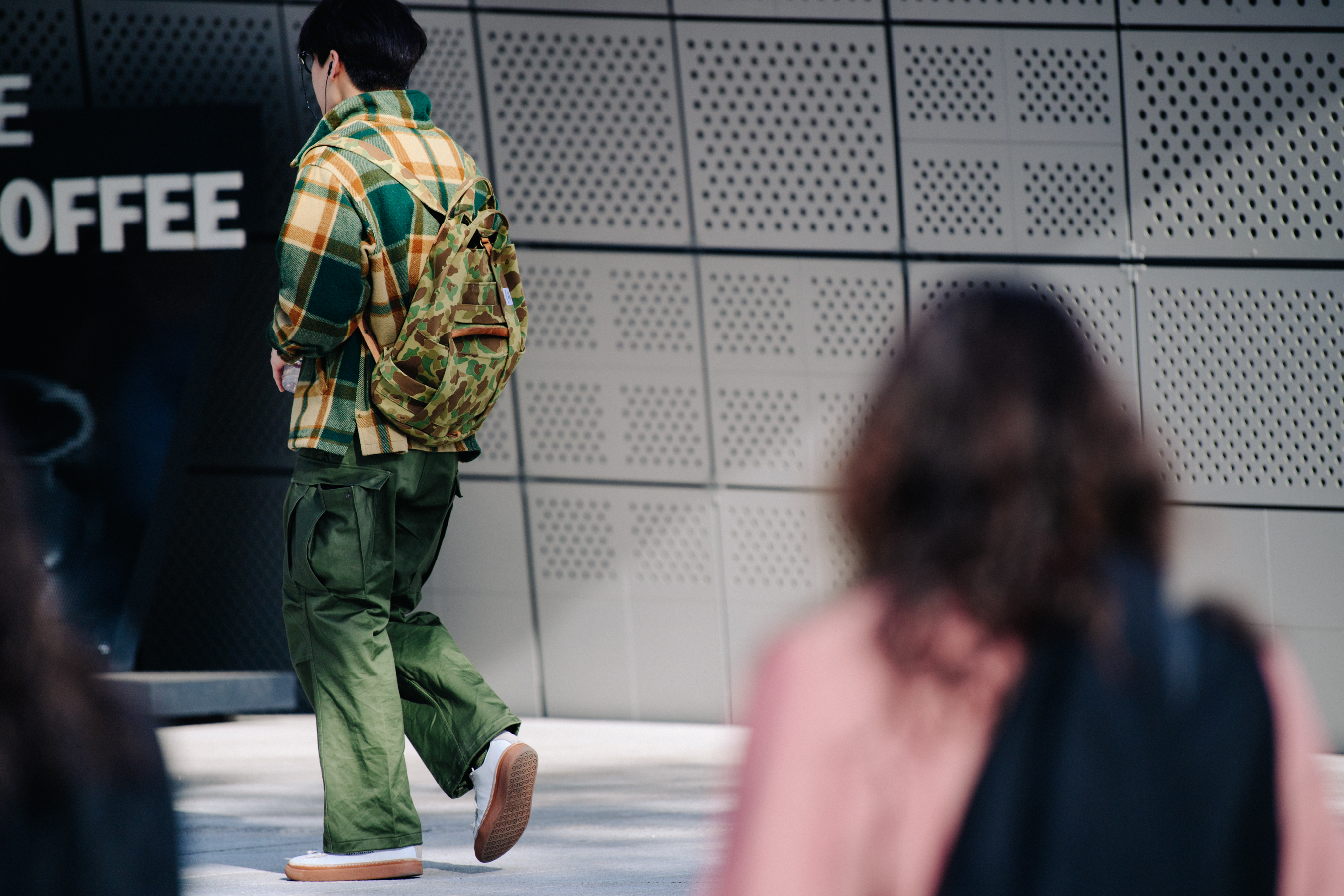 Man wearing green and camouflage