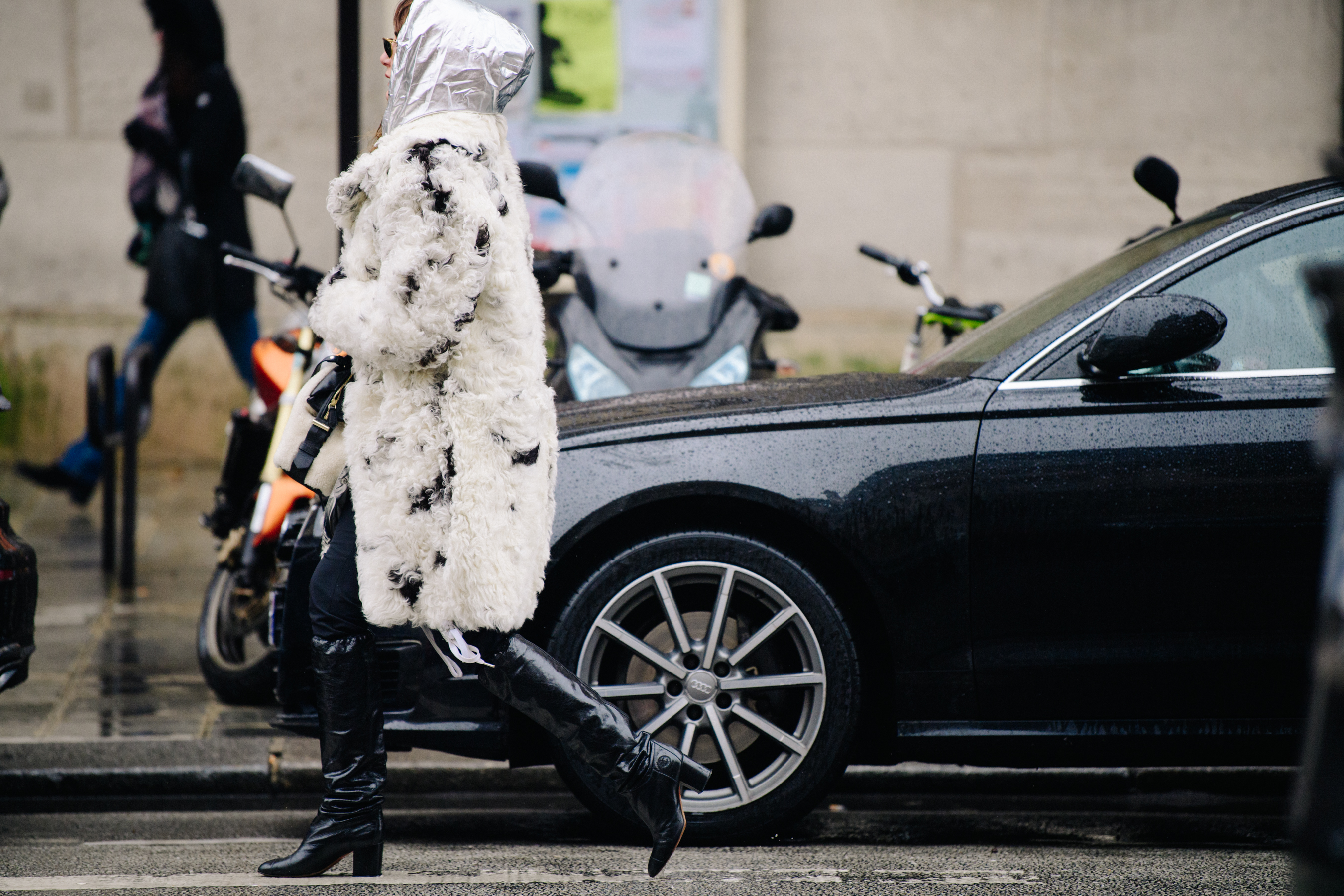 Woman wearing Chanel leather boots