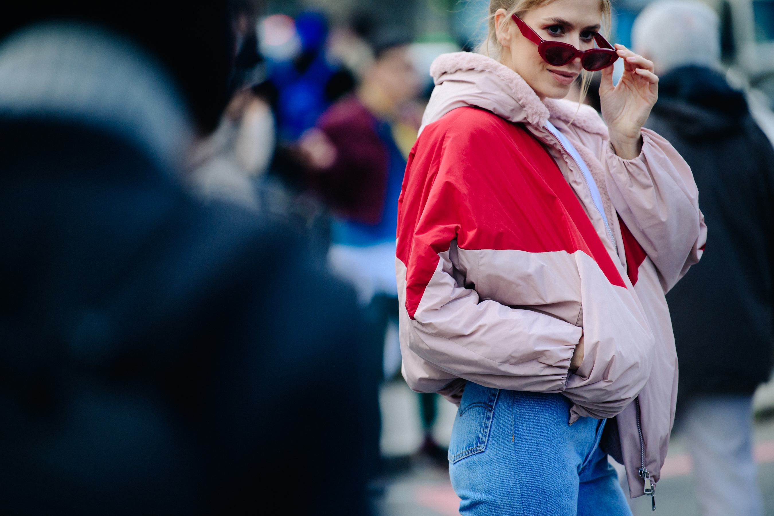 Russian woman wearing red sunglasses