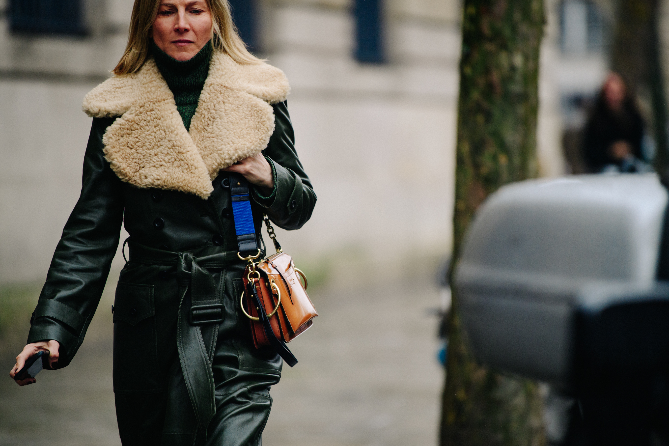 Woman wearing shearling and leather coat