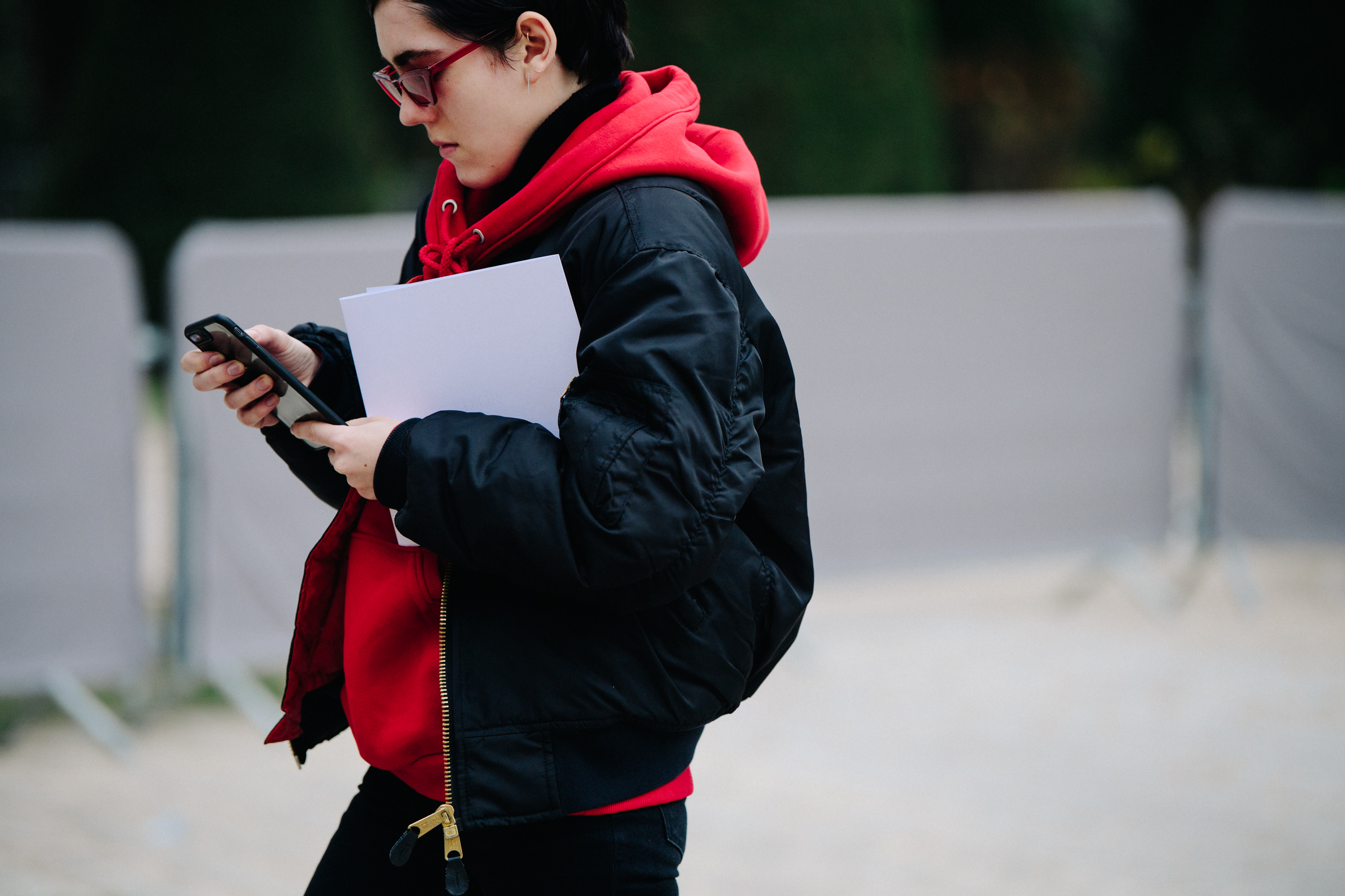 Editor wearing red hoodie