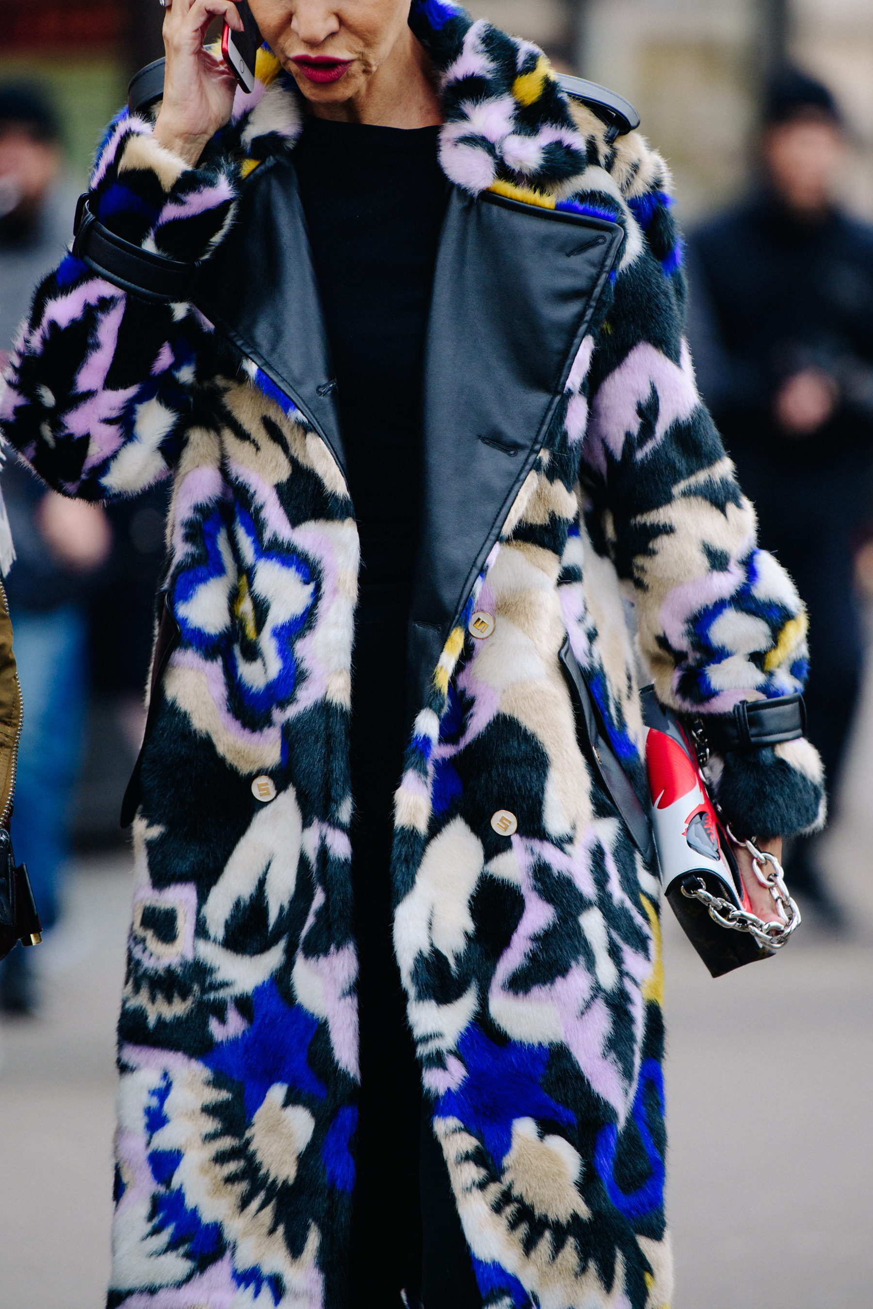 Woman wearing colourful fur coat