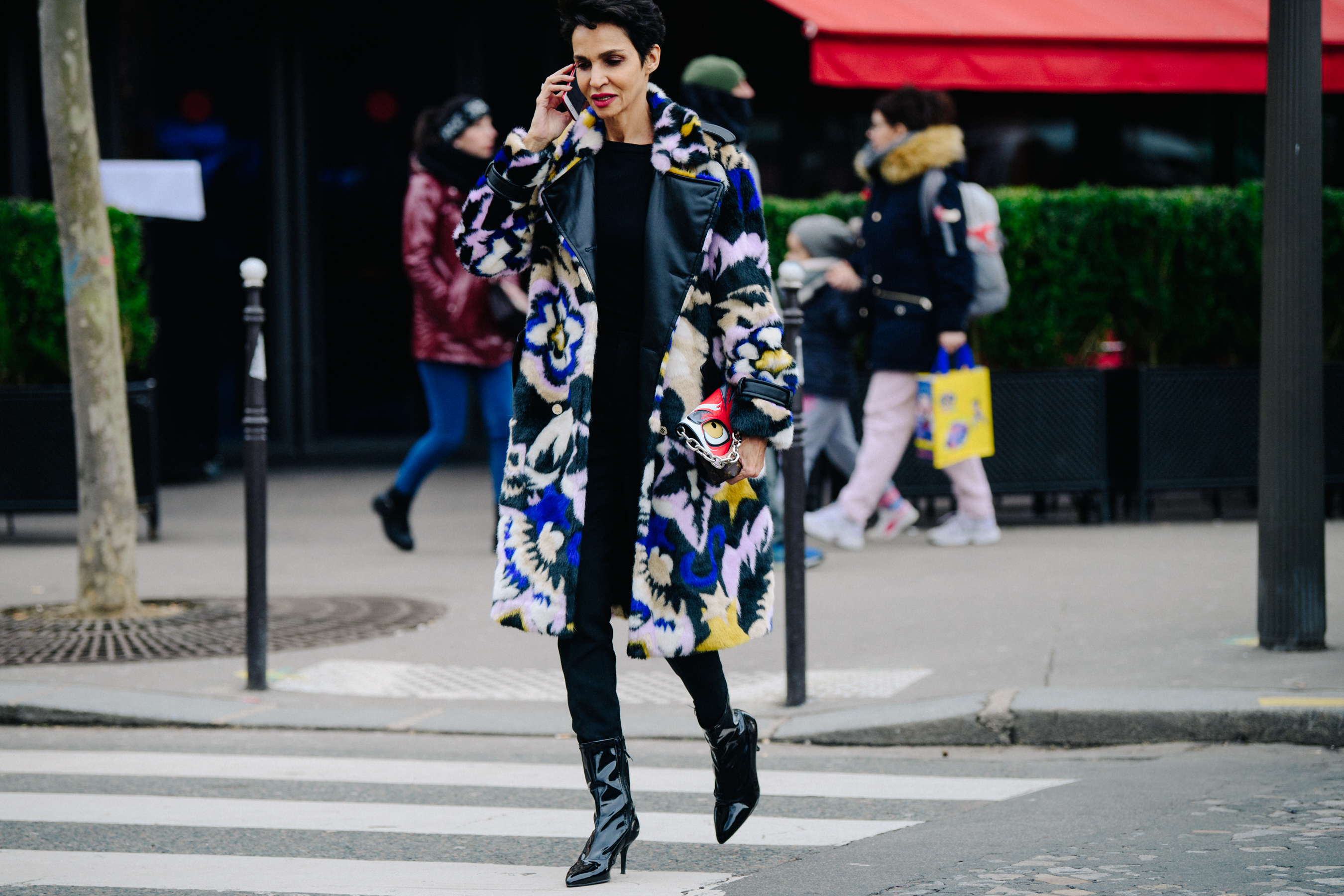 Woman wearing colourful fur coat